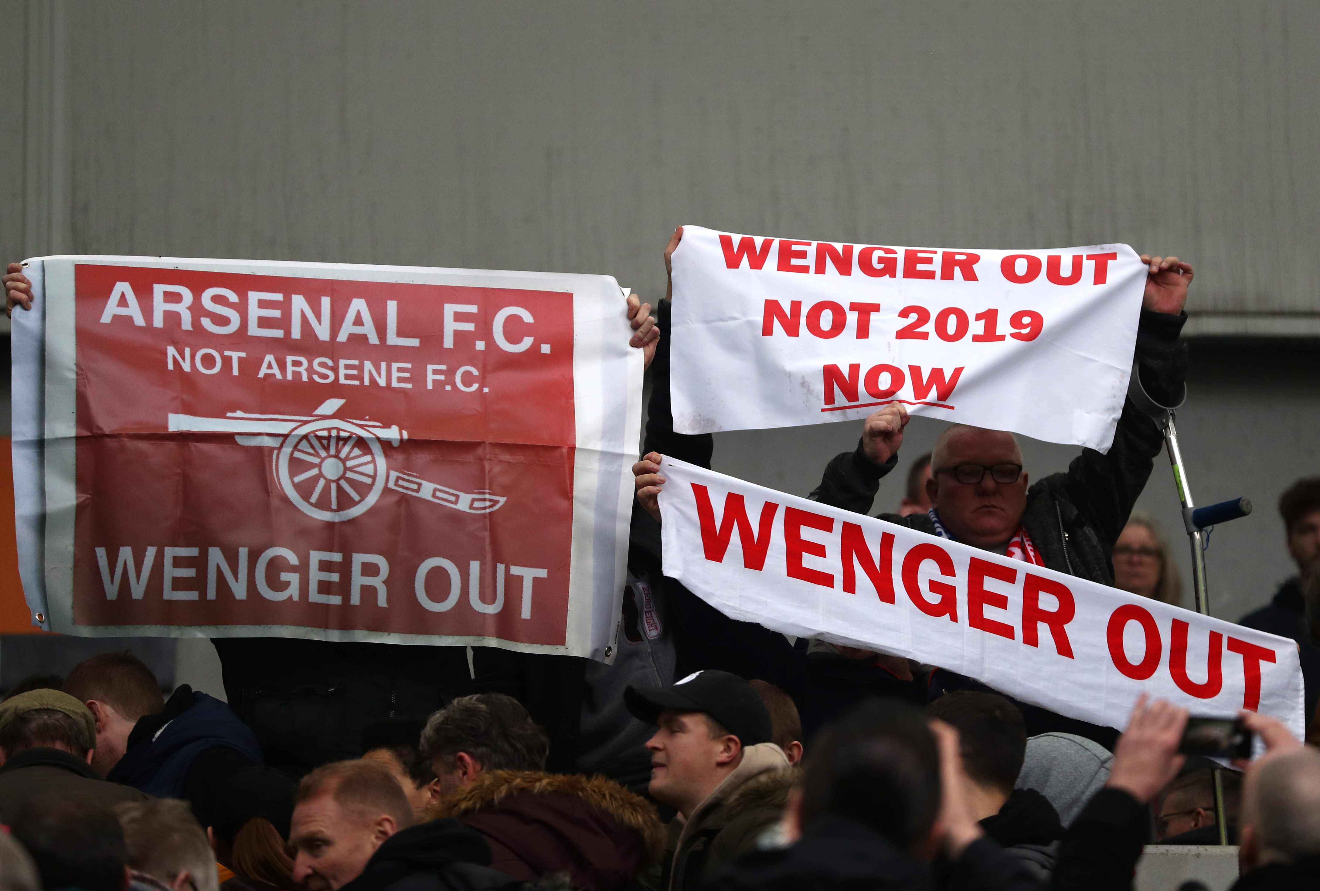 BRIGHTON, ENGLAND - MARCH 04:  Fans protest towards Arsene Wenger, Manager of Arsenal (not pictured) following the Premier League match between Brighton and Hove Albion and Arsenal at Amex Stadium on March 4, 2018 in Brighton, England.  (Photo by Catherine Ivill/Getty Images)