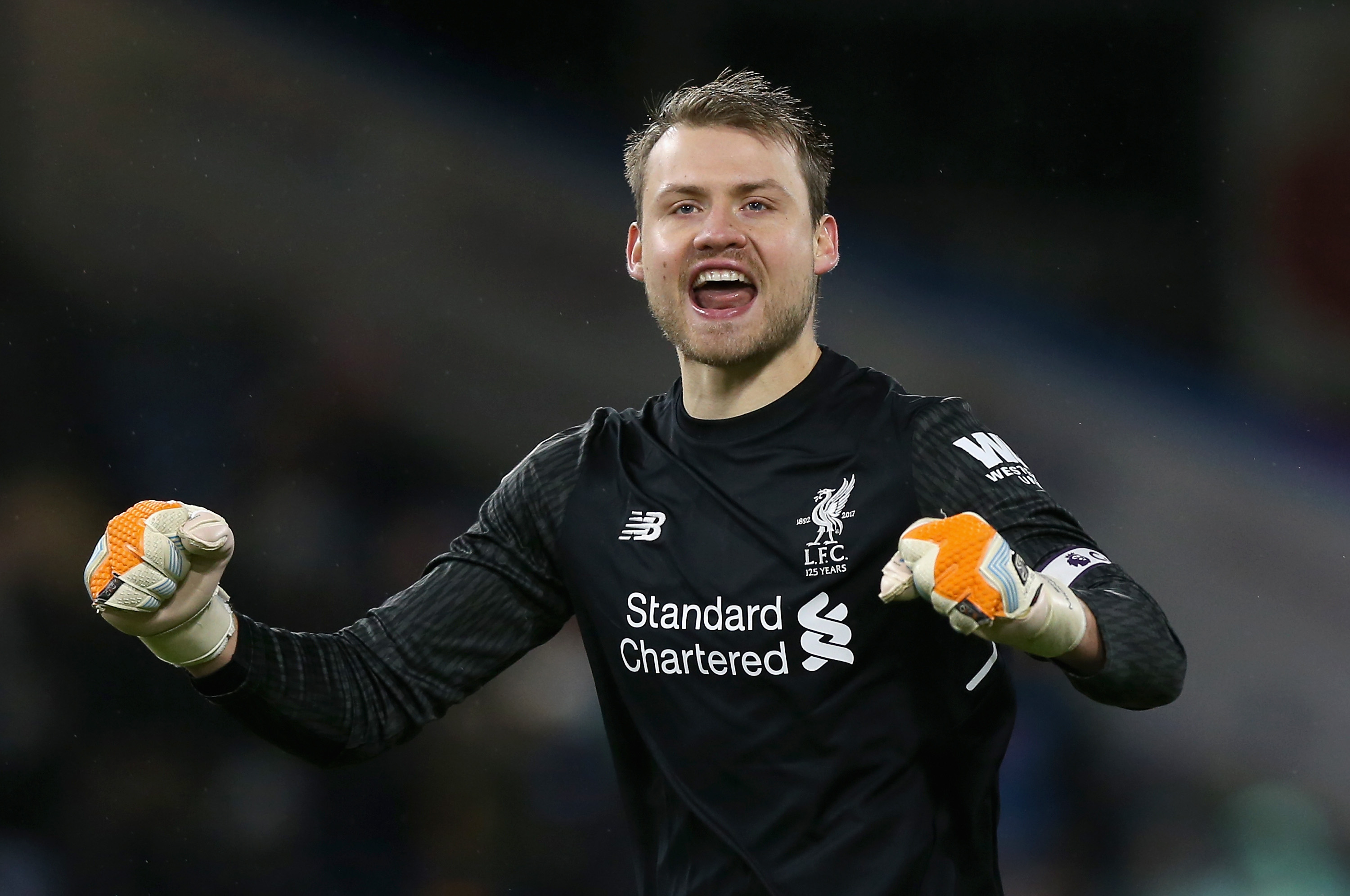 BURNLEY, ENGLAND - JANUARY 01: Simon Mignolet of Liverpool celebrates victory after the Premier League match between Burnley and Liverpool at Turf Moor on January 1, 2018 in Burnley, England.  (Photo by Nigel Roddis/Getty Images)