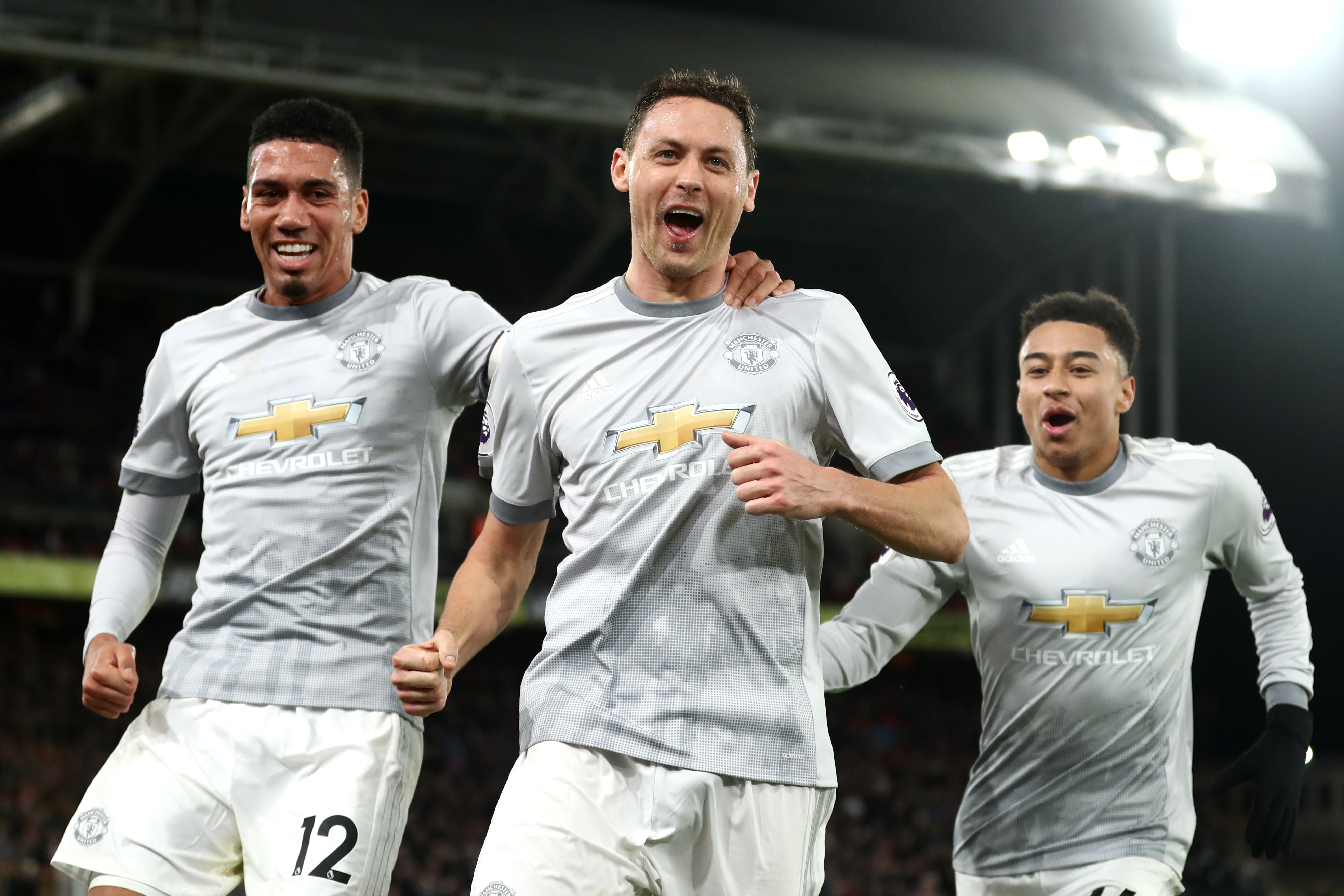 LONDON, ENGLAND - MARCH 05:  Nemanja Matic of Manchester United celebrates scoring the third Manchester United goal with Chris Smalling and Jesse Lingard during the Premier League match between Crystal Palace and Manchester United at Selhurst Park on March 5, 2018 in London, England.  (Photo by Catherine Ivill/Getty Images)