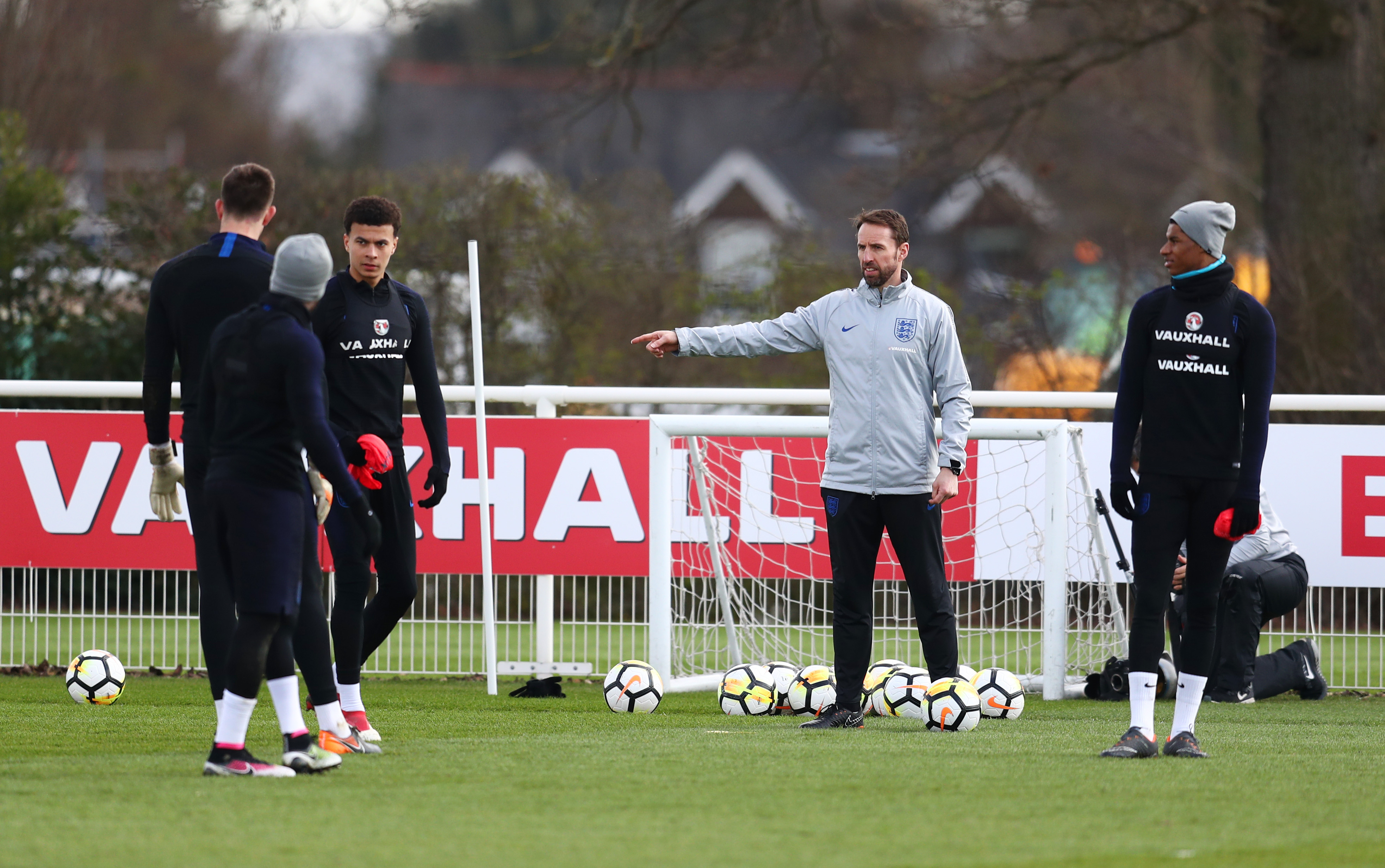 ENFIELD, ENGLAND - MARCH 26:  Gareth Southgate manager of England talks to players during an England training session, on the eve of their international friendly against Italy at Tottenham Hotspur Training Centre, on March 26, 2018 in Enfield, England.  (Photo by Catherine Ivill/Getty Images)