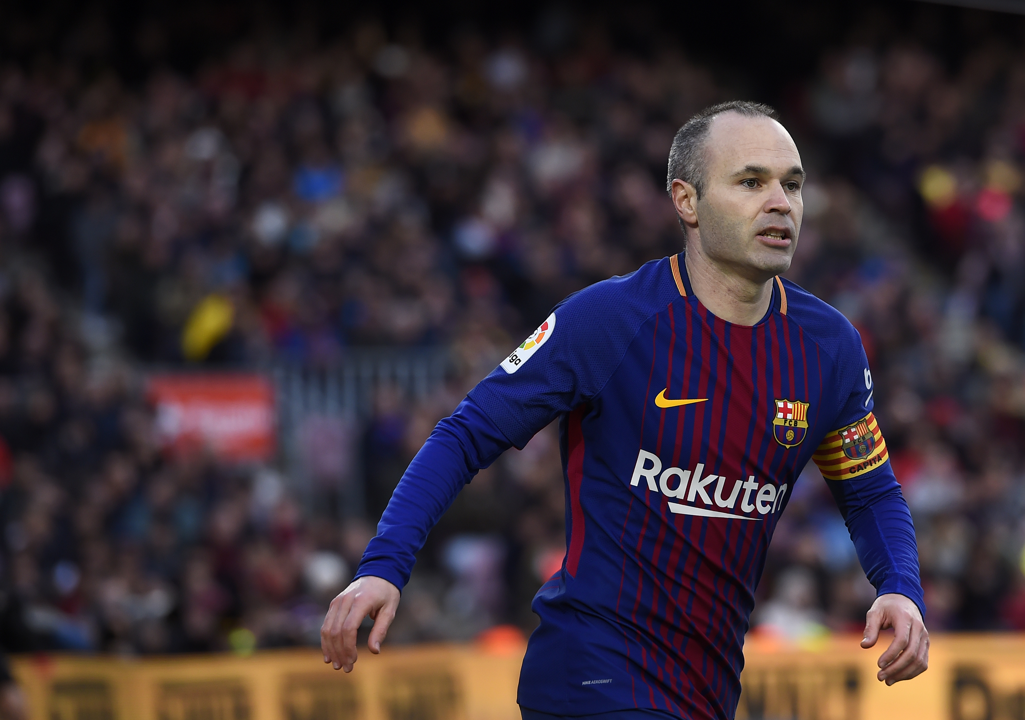 Barcelona's Spanish midfielder Andres Iniesta looks on during the Spanish league football match between FC Barcelona and Getafe CF at the Camp Nou stadium in Barcelona on February 11, 2018. / AFP PHOTO / Josep LAGO        (Photo credit should read JOSEP LAGO/AFP/Getty Images)