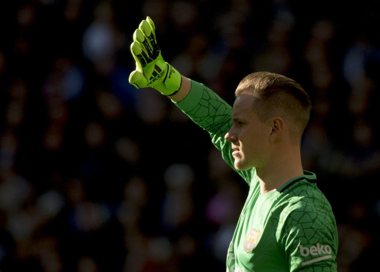 Barcelona's German goalkeeper Marc-Andre Ter Stegen looks on during the Spanish League "Clasico" football match Real Madrid CF vs FC Barcelona at the Santiago Bernabeu stadium in Madrid on December 23, 2017.  / AFP PHOTO / CURTO DE LA TORRE        (Photo credit should read CURTO DE LA TORRE/AFP/Getty Images)