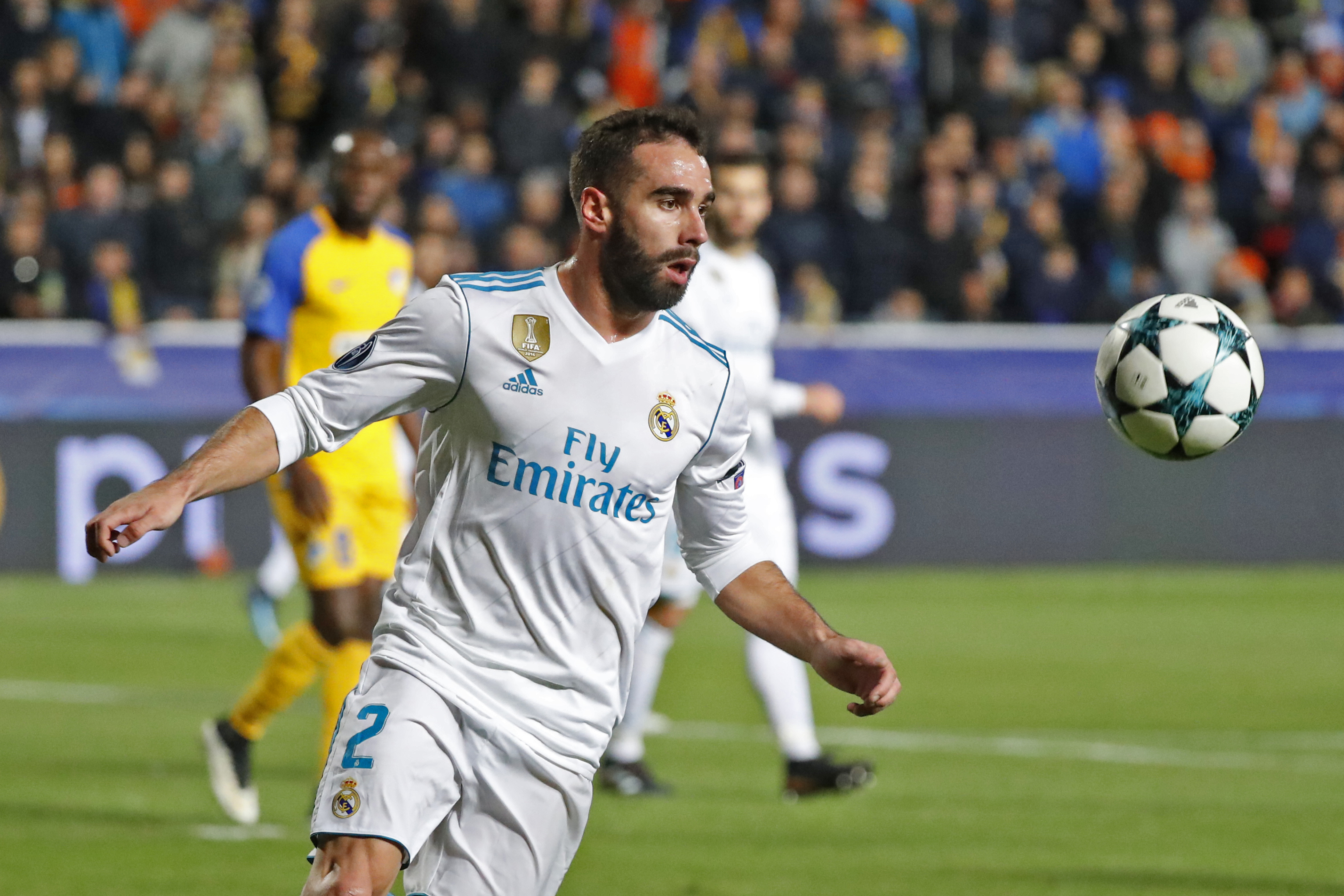 Real Madrid's Spanish defender Dani Carvajal advances with the ball during the UEFA Champions League Group H match between Apoel FC and Real Madrid on November 21, 2017, in the Cypriot capital Nicosia's GSP Stadium.  / AFP PHOTO / Jack GUEZ        (Photo credit should read JACK GUEZ/AFP/Getty Images)