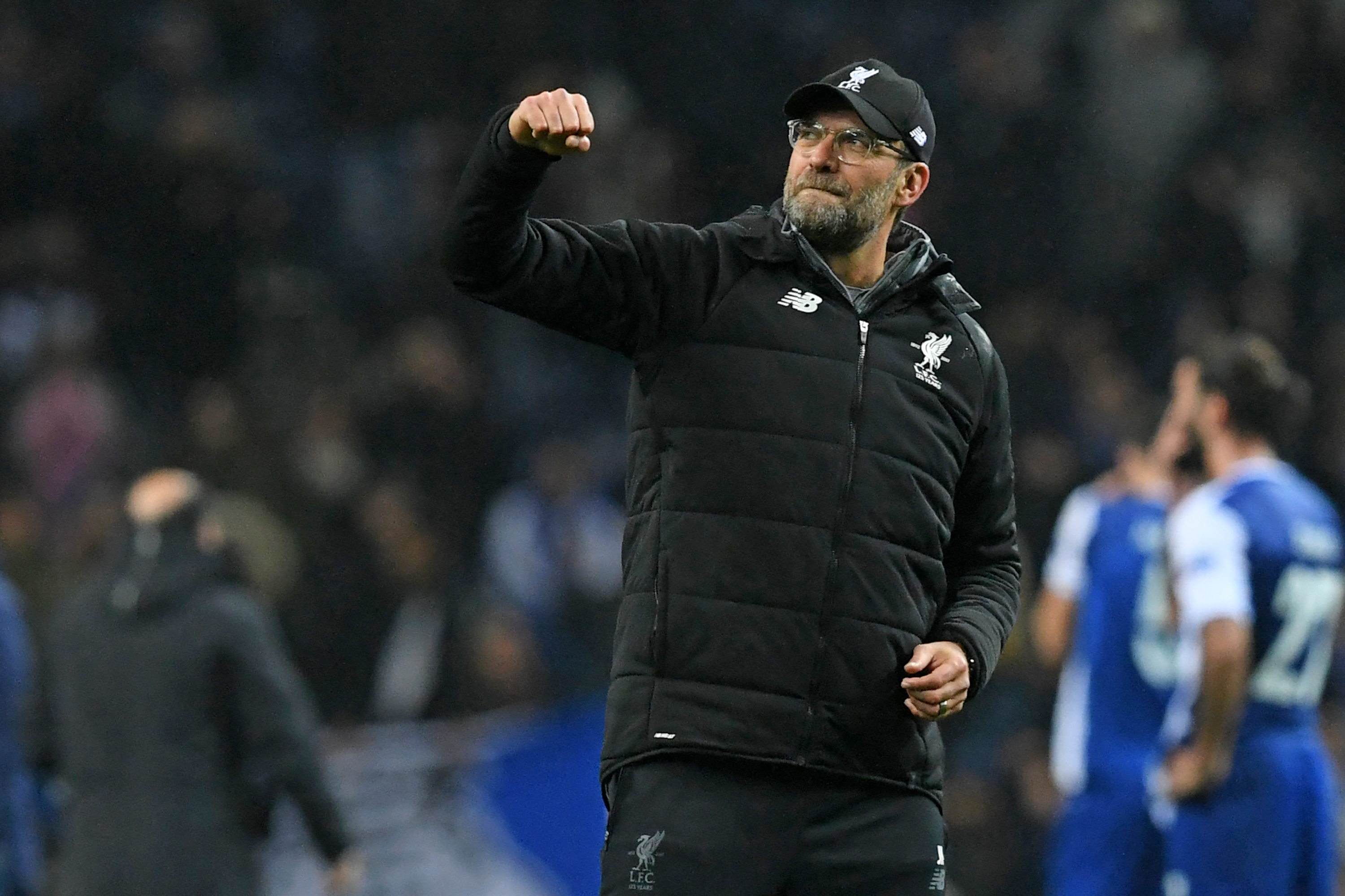 Liverpool's German manager Jurgen Klopp celebrates their victory on the pitch after the UEFA Champions League round of sixteen first leg football match between FC Porto and Liverpool at the Dragao stadium in Porto, Portugal on February 14, 2018.
Liverpool won the game 5-0. / AFP PHOTO / Francisco LEONG        (Photo credit should read FRANCISCO LEONG/AFP/Getty Images)