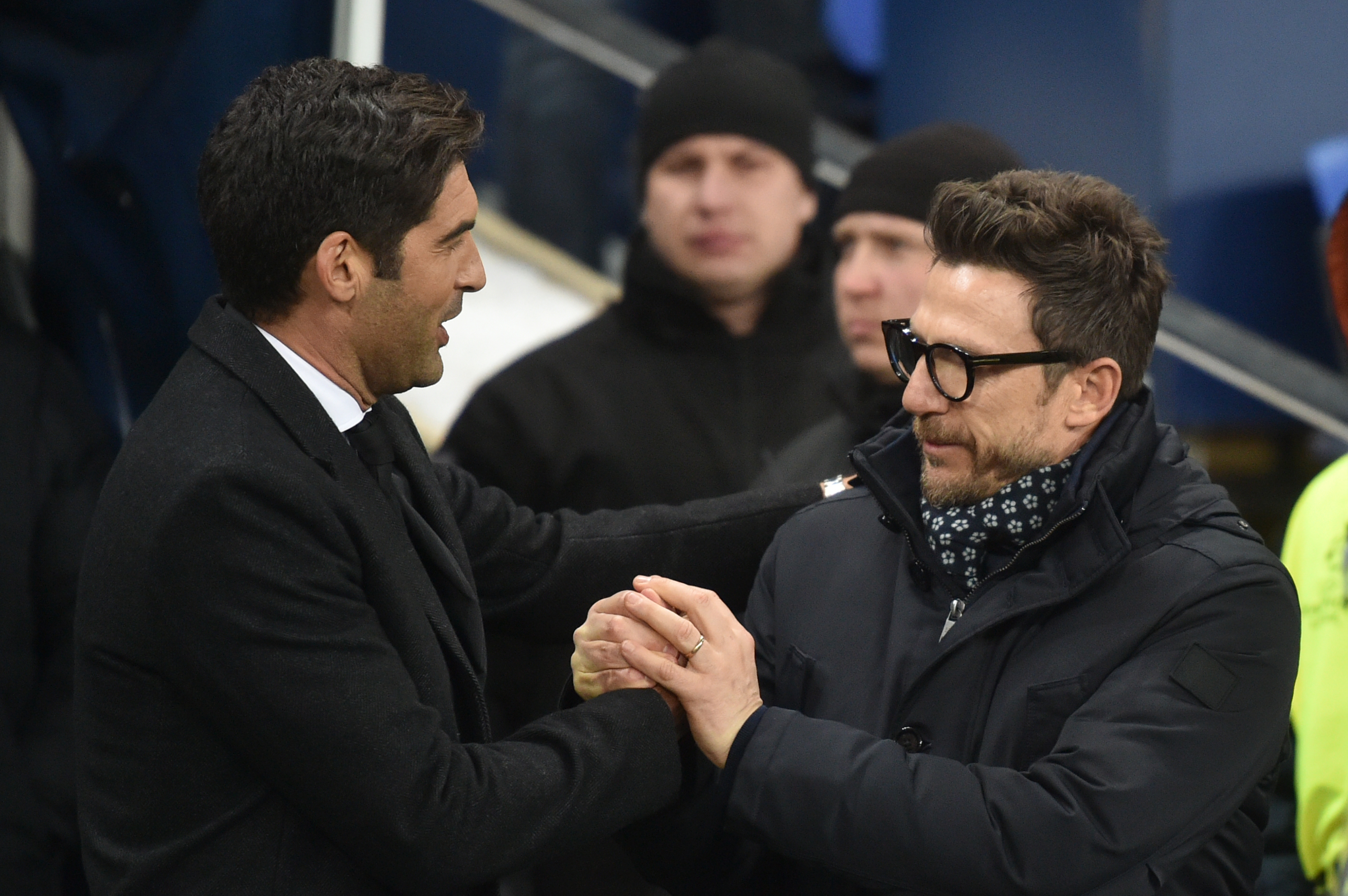 Donetsk's Portuguese head coach Paulo Fonseca (L) and Roma's Italian head coach Eusebio Di Francesco shake handes before the UEFA Champions League round of 16 first leg football match between Shaktar Donetsk and AS Rome at the OSK Metalist Stadion in Kharkiv on February 21, 2018. / AFP PHOTO / Genya SAVILOV        (Photo credit should read GENYA SAVILOV/AFP/Getty Images)