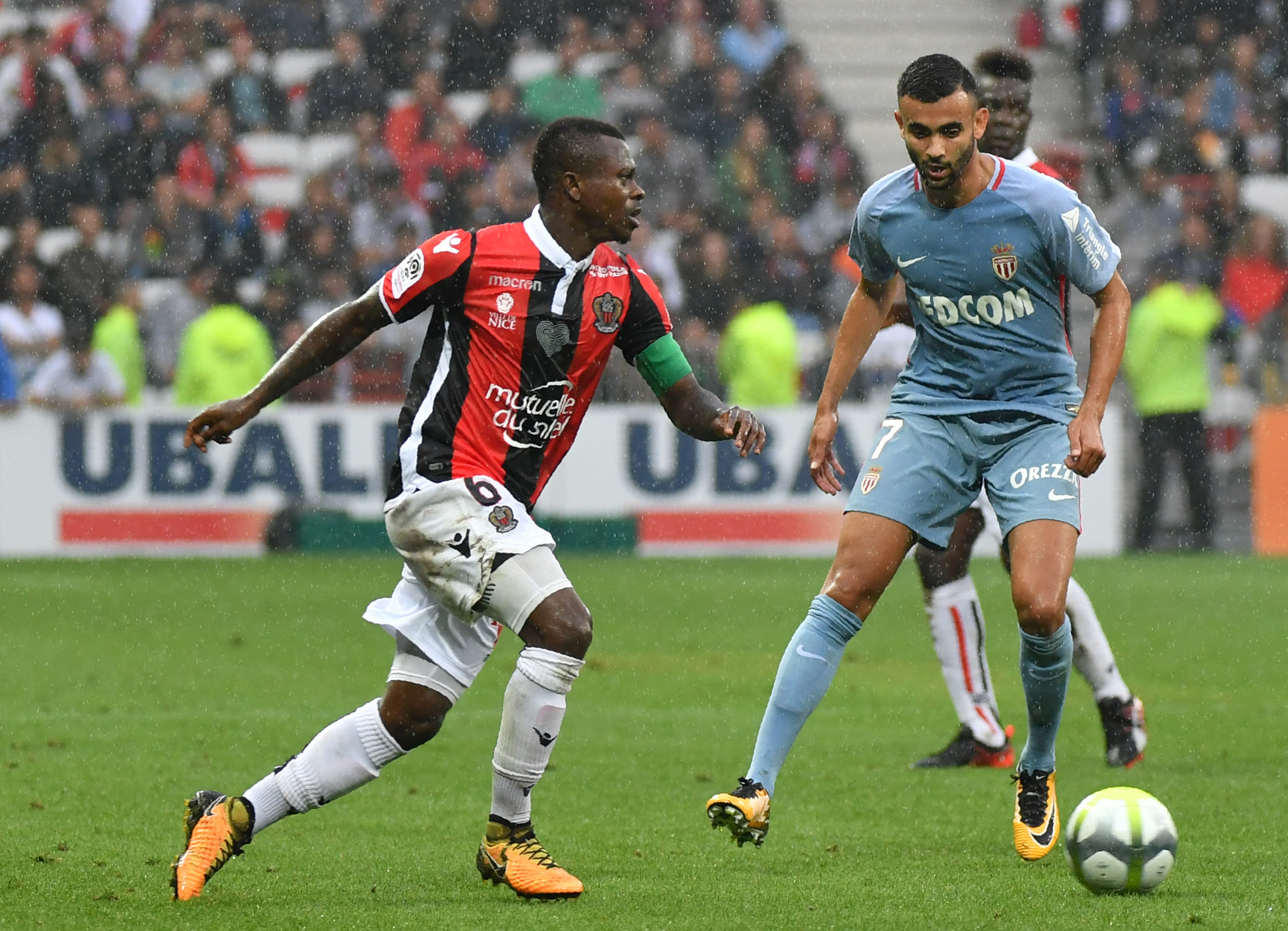 Nice's Ivorian midfielder Jean Michael Seri (L) vies with Monaco's French midfielder Rachid Ghezzal during the French L1 football match Nice (OGCN) vs Monaco (ASM) on September 9, 2017 at the "Allianz Riviera" stadium in Nice, southeastern France.   / AFP PHOTO / YANN COATSALIOU        (Photo credit should read YANN COATSALIOU/AFP/Getty Images)