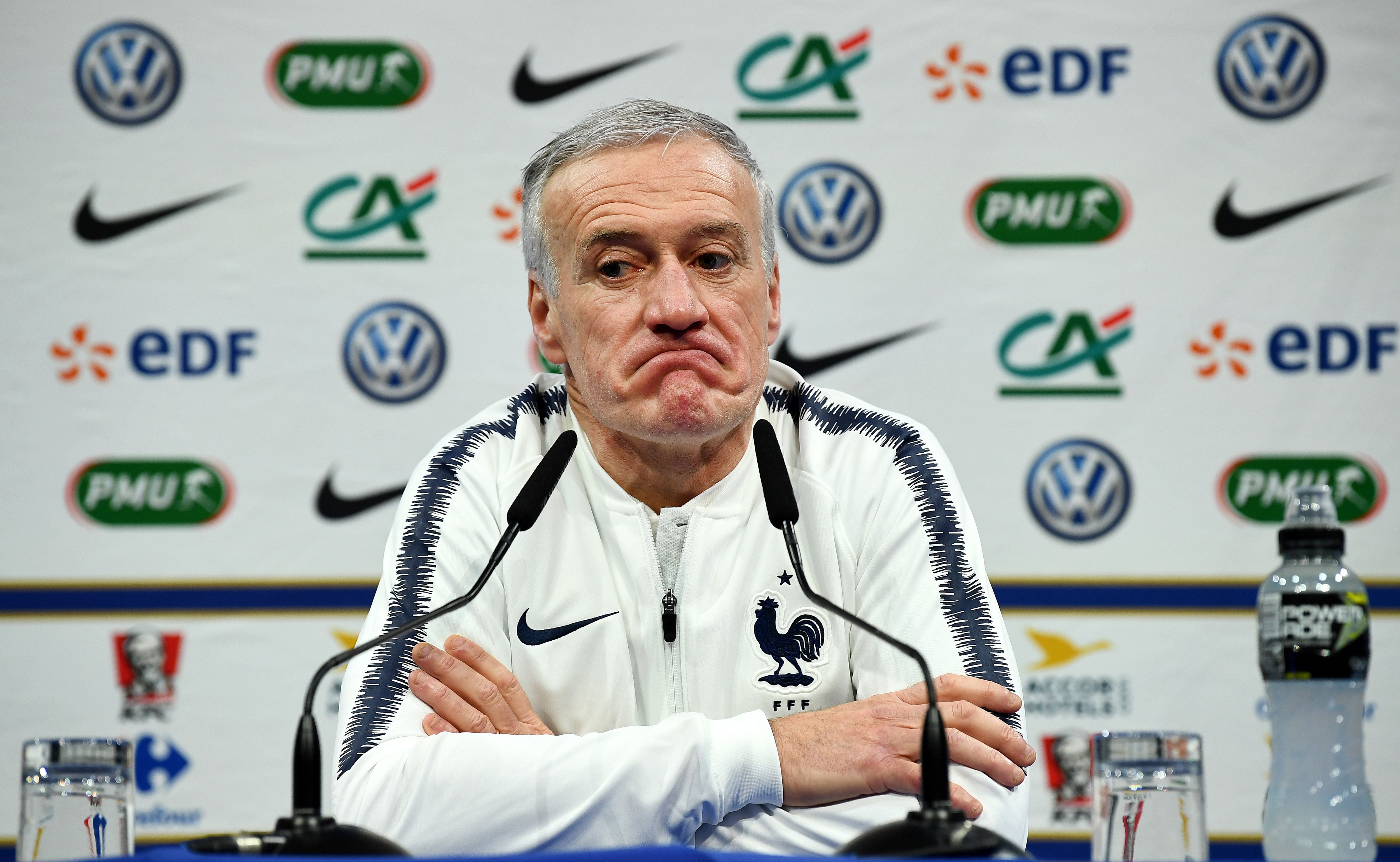 France's head coach Didier Deschamps grimaces during a press conference in Clairefontaine on March 19, 2018, as part of the team's preparation for the friendly football match against Colombia and Russia.  / AFP PHOTO / FRANCK FIFE        (Photo credit should read FRANCK FIFE/AFP/Getty Images)