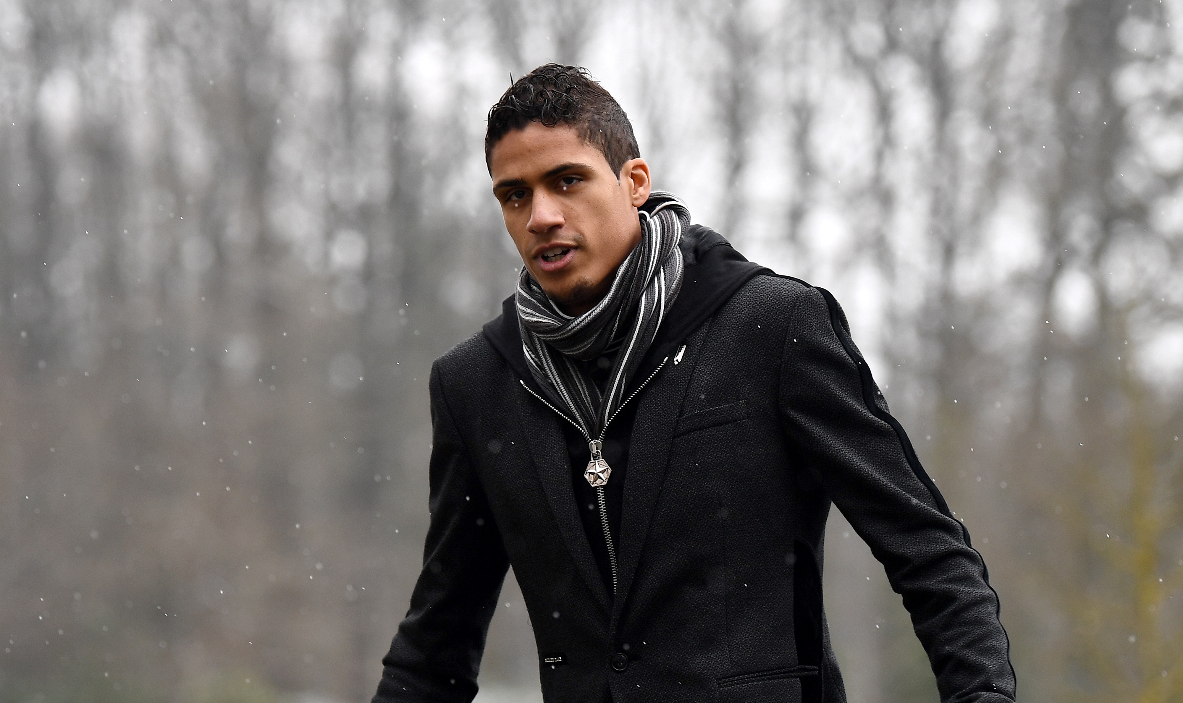 France's defender Raphaël Varane arrives at the French national football team training base in Clairefontaine-en-Yvelines, on March 19, 2018, as part of the  preparation for the team's upcoming friendly matches. / AFP PHOTO / FRANCK FIFE        (Photo credit should read FRANCK FIFE/AFP/Getty Images)