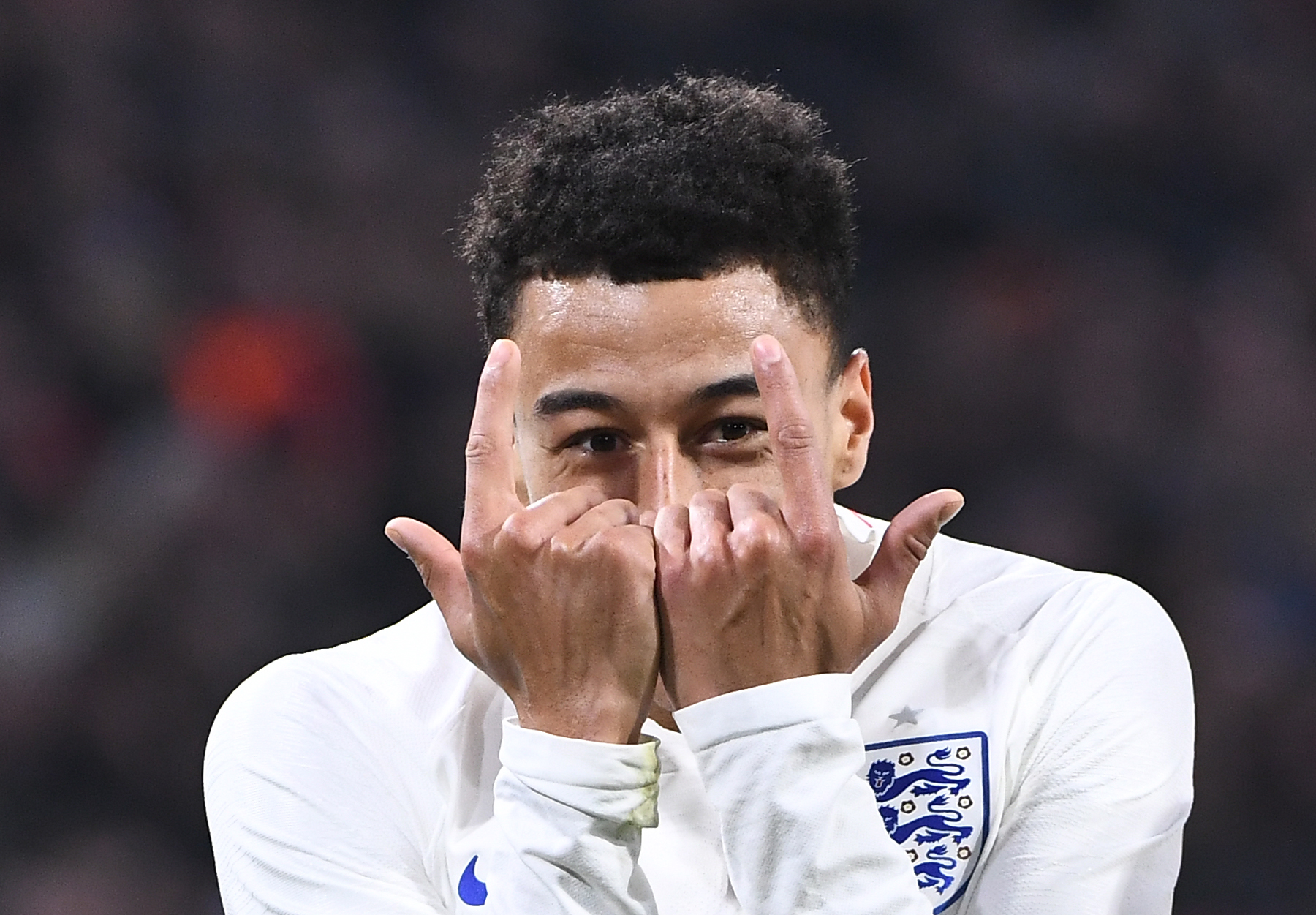 English player Jesse Lingard celebrates after scoring during a friendly football match between the Netherlands and England at the Amsterdam Arena in Amsterdam on March 23, 2018.   / AFP PHOTO / Emmanuel DUNAND        (Photo credit should read EMMANUEL DUNAND/AFP/Getty Images)