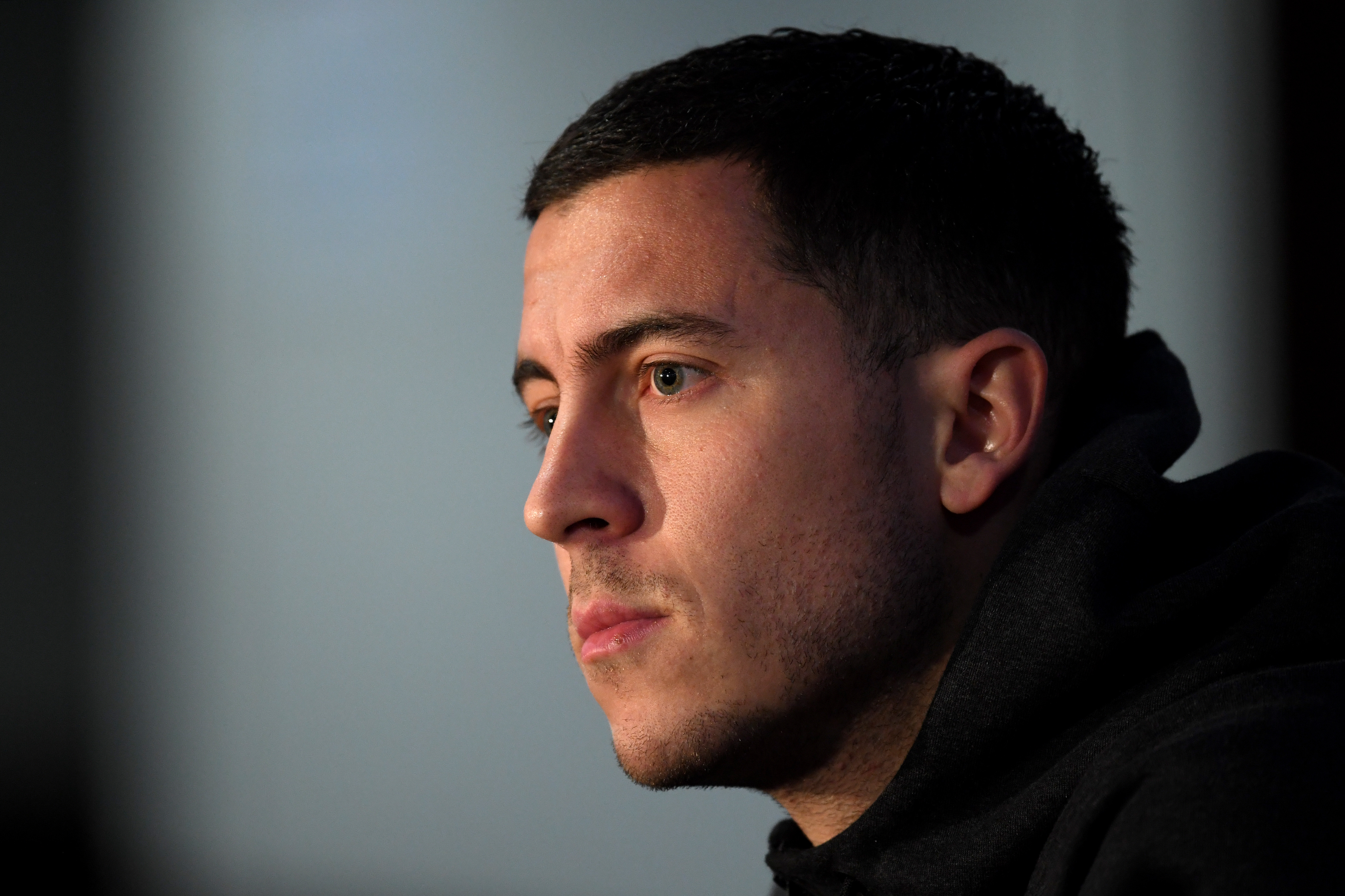 LONDON, ENGLAND - FEBRUARY 19:  Eden Hazard of Chelsea looks on during a Chelsea FC Press Conference ahead of their Champions League last 16 match against FC Barcelona at Stamford Bridge on February 19, 2018 in London, England.  (Photo by Mike Hewitt/Getty Images)