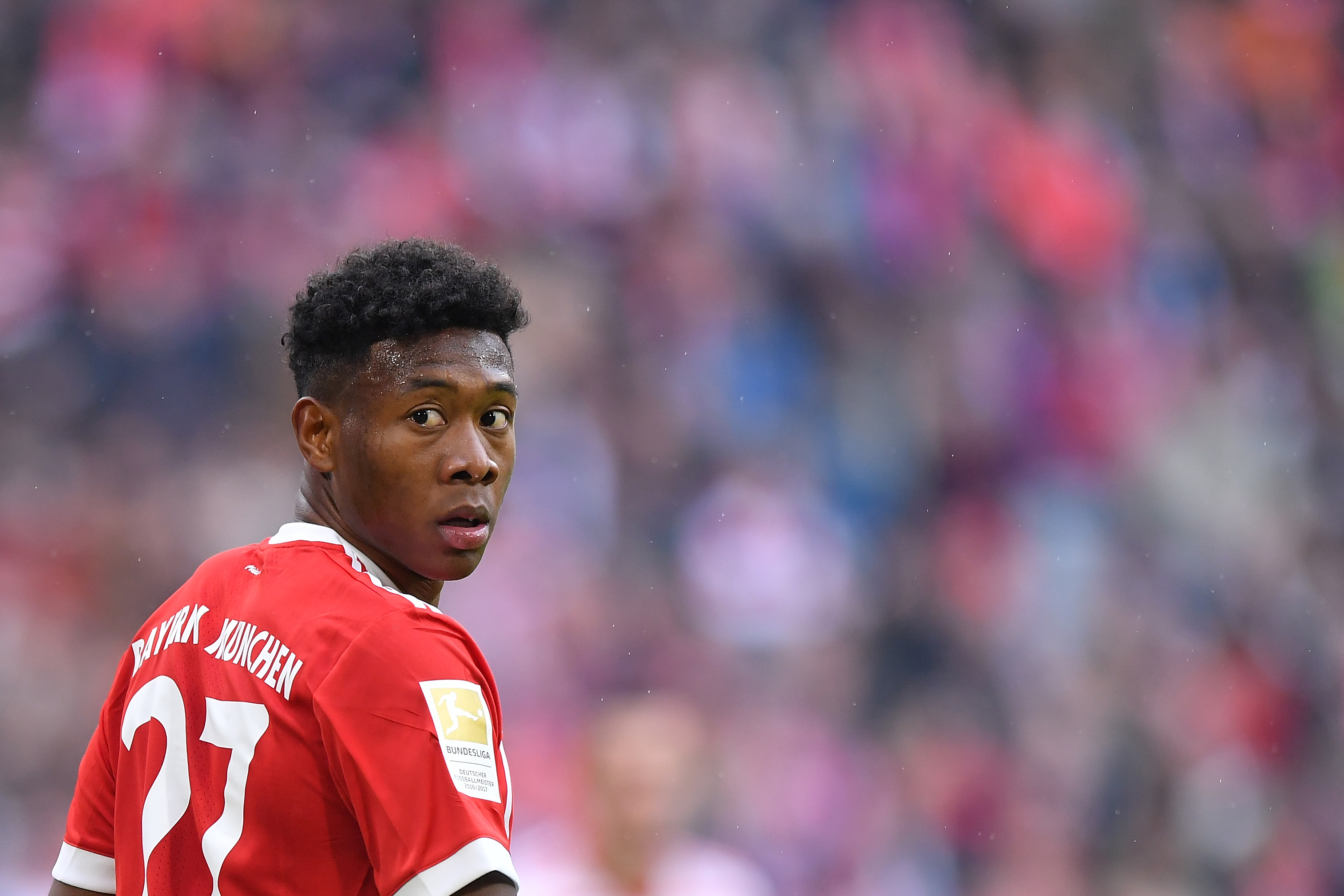 MUNICH, GERMANY - MARCH 10: David Alaba of Bayern Muenchen looks over his shoulder during the Bundesliga match between FC Bayern Muenchen and Hamburger SV at Allianz Arena on March 10, 2018 in Munich, Germany. (Photo by Sebastian Widmann/Bongarts/Getty Images)