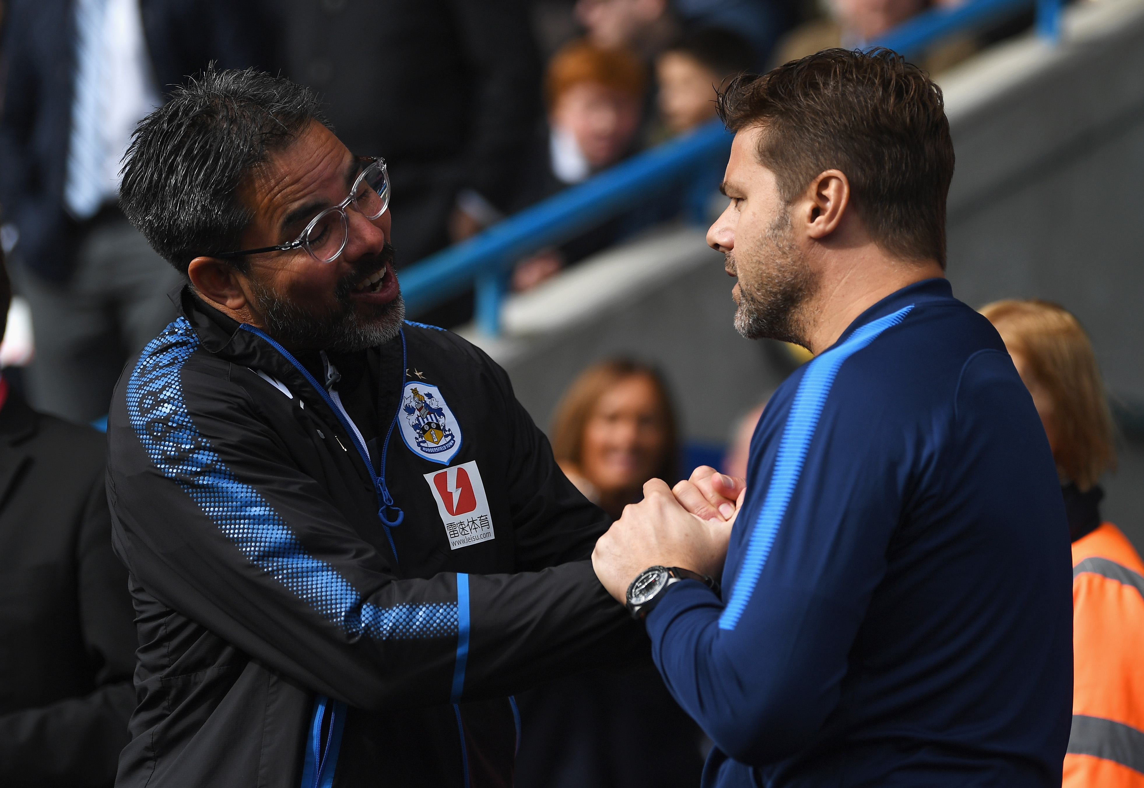 HUDDERSFIELD, ENGLAND - SEPTEMBER 30:  David Wagner, Manager of Huddersfield Town and Mauricio Pochettino, Manager of Tottenham Hotspur shake hands prior to the Premier League match between Huddersfield Town and Tottenham Hotspur at John Smith's Stadium on September 30, 2017 in Huddersfield, England.  (Photo by Gareth Copley/Getty Images)