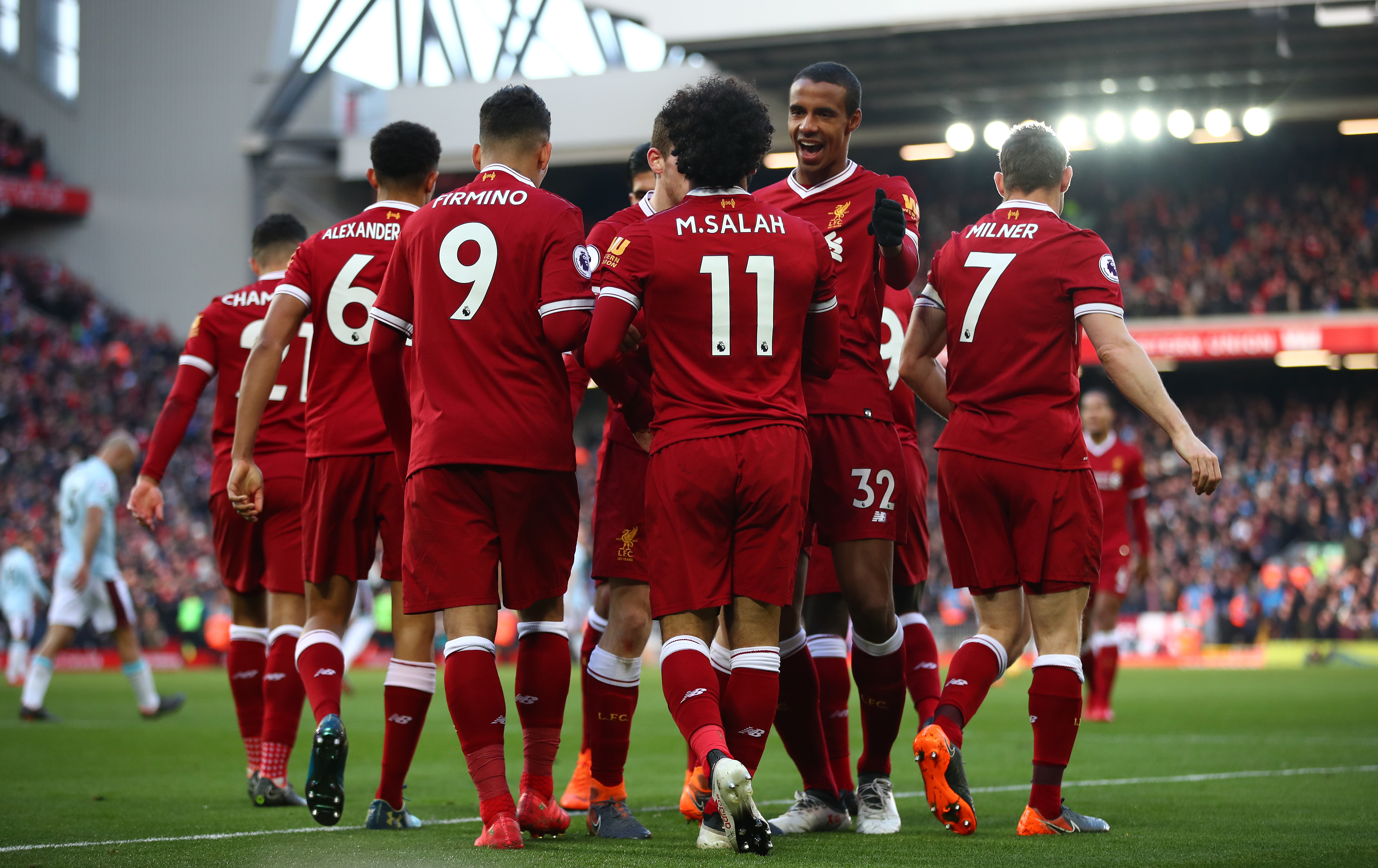 LIVERPOOL, ENGLAND - FEBRUARY 24:  Mohamed Salah of Liverpool celebrates scoring his side's second goal with team mate Joel Matip during the Premier League match between Liverpool and West Ham United at Anfield on February 24, 2018 in Liverpool, England.  (Photo by Clive Brunskill/Getty Images)