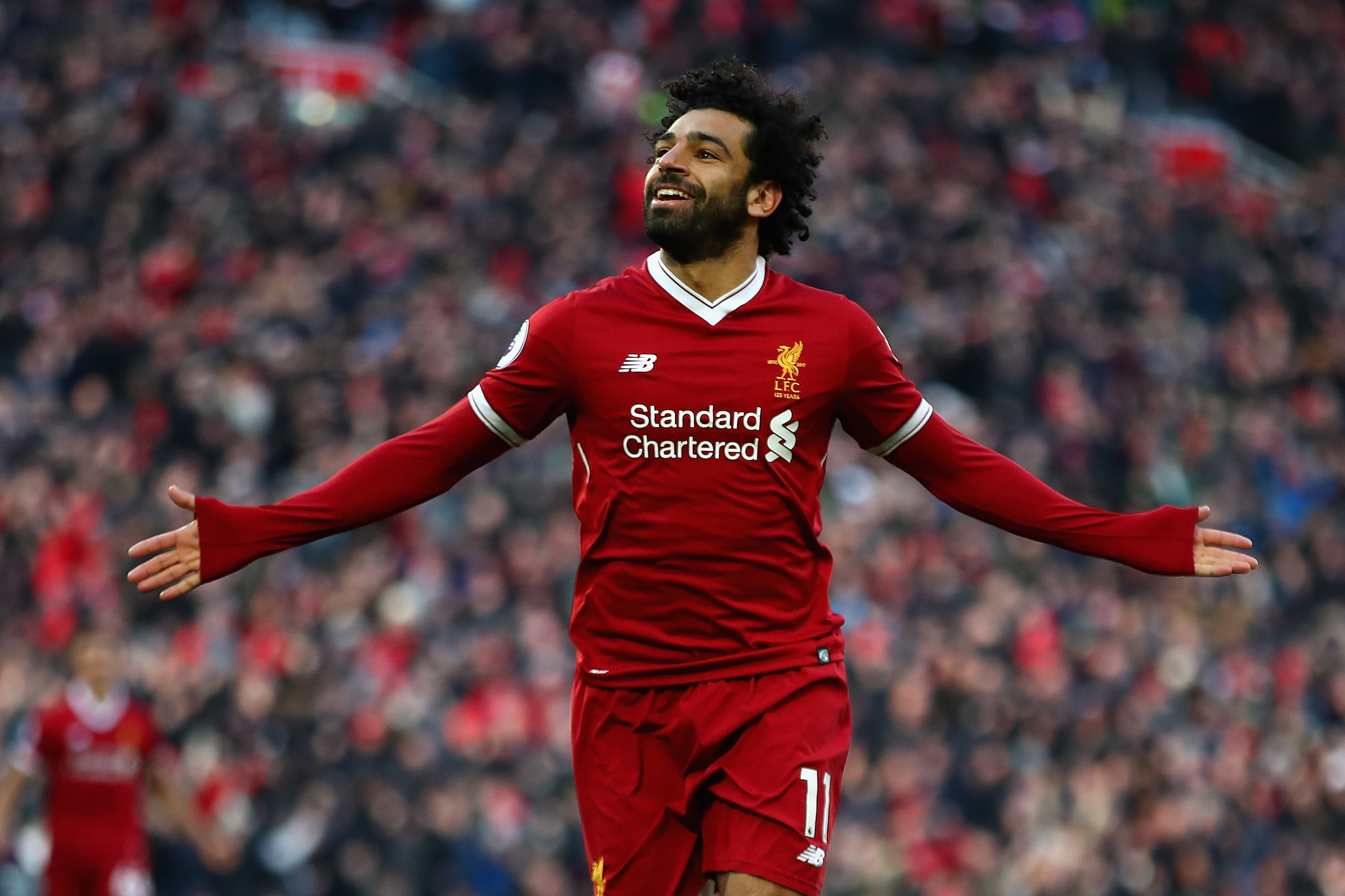 LIVERPOOL, ENGLAND - FEBRUARY 24:  Mohamed Salah of Liverpool celebrates scoring his side's second goal  during the Premier League match between Liverpool and West Ham United at Anfield on February 24, 2018 in Liverpool, England.  (Photo by Clive Brunskill/Getty Images)