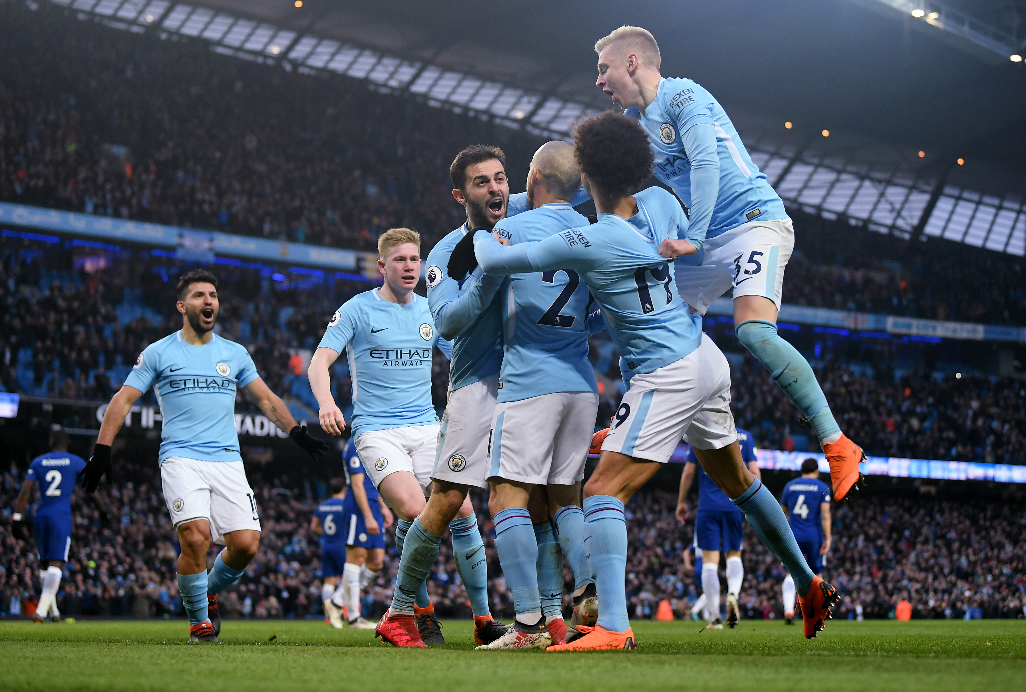 MANCHESTER, ENGLAND - MARCH 04:  Bernardo Silva of Manchester City is congratulated after scoring the opening goal during the Premier League match between Manchester City and Chelsea at Etihad Stadium on March 4, 2018 in Manchester, England.  (Photo by Laurence Griffiths/Getty Images)