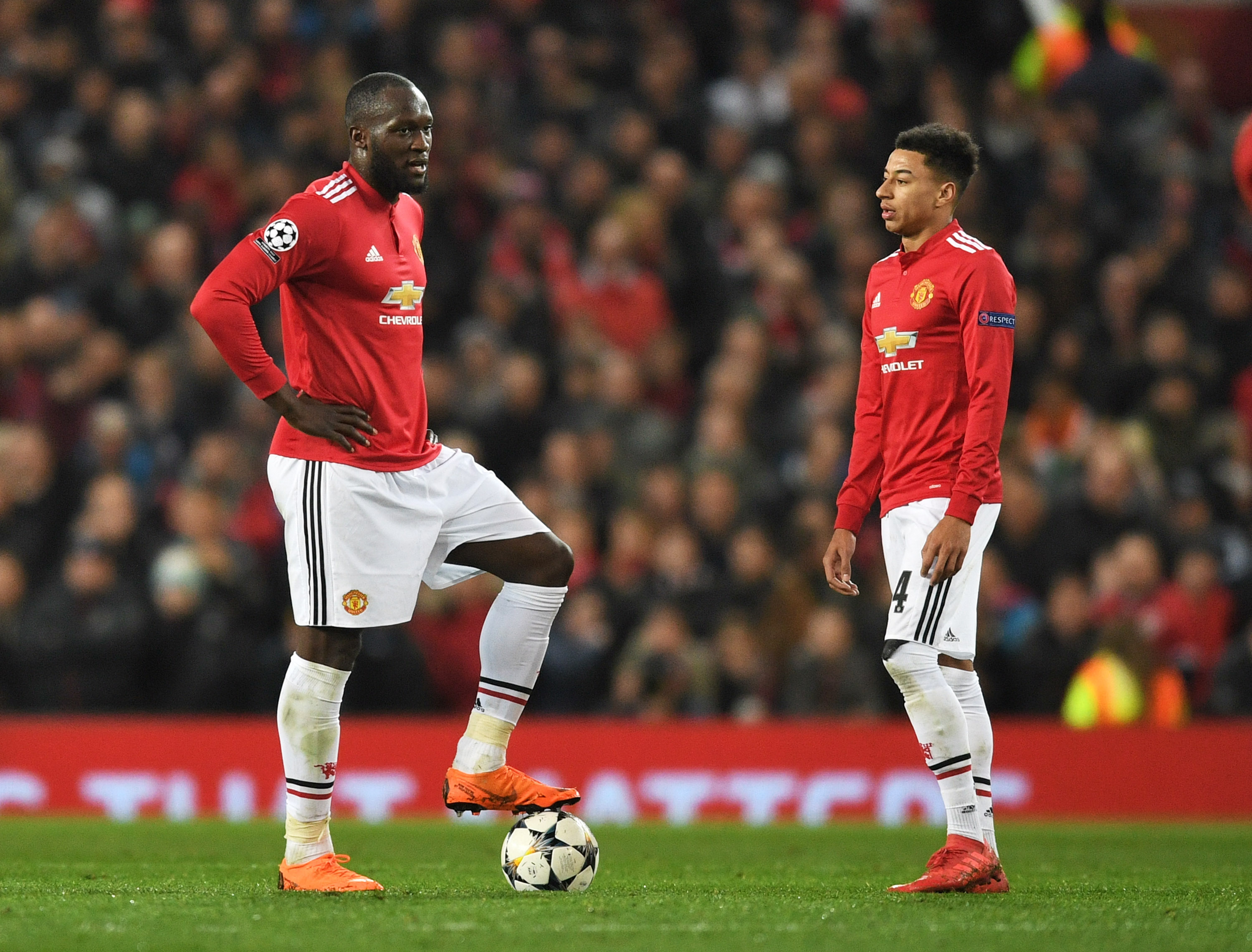 MANCHESTER, ENGLAND - MARCH 13:  Romelu Lukaku and Jesse Lingard of Manchester United look dejected during the UEFA Champions League Round of 16 Second Leg match between Manchester United and Sevilla FC at Old Trafford on March 13, 2018 in Manchester, United Kingdom.  (Photo by Michael Regan/Getty Images)