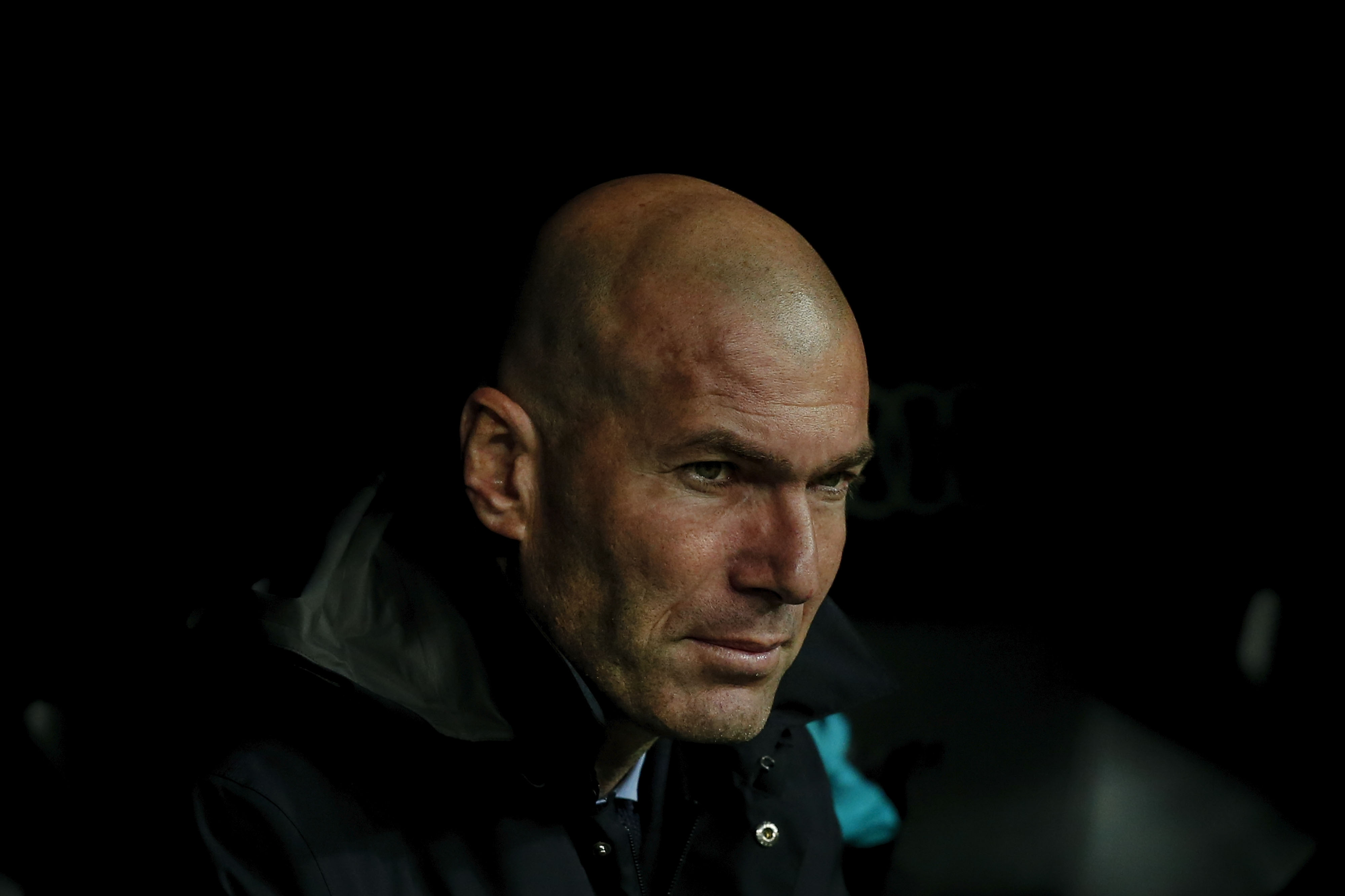 MADRID, SPAIN - MARCH 03: Head coach Zinedine Zidane of Real Madrid CF looks on from the bench prior to start the La Liga match between Real Madrid CF and Getafe CF at Estadio Santiago Bernabeu on March 3, 2018 in Madrid, Spain. (Photo by Gonzalo Arroyo Moreno/Getty Images)
