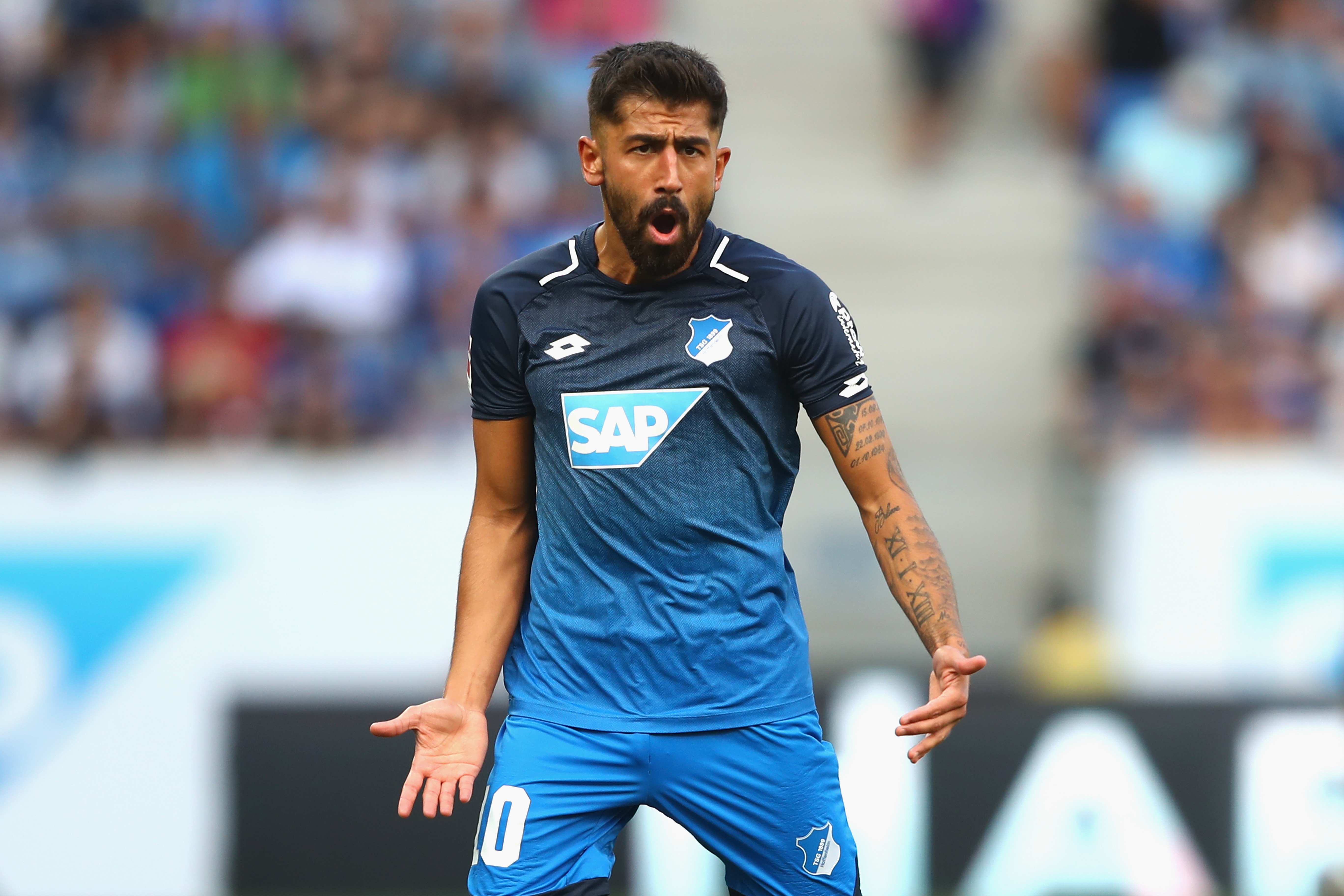 SINSHEIM, GERMANY - AUGUST 19: Kerem Demirbay  of Hoffenheim reacts during the Bundesliga match between TSG 1899 Hoffenheim and SV Werder Bremen at Wirsol Rhein-Neckar-Arena on August 19, 2017 in Sinsheim, Germany.  (Photo by Alexander Hassenstein/Bongarts/Getty Images)