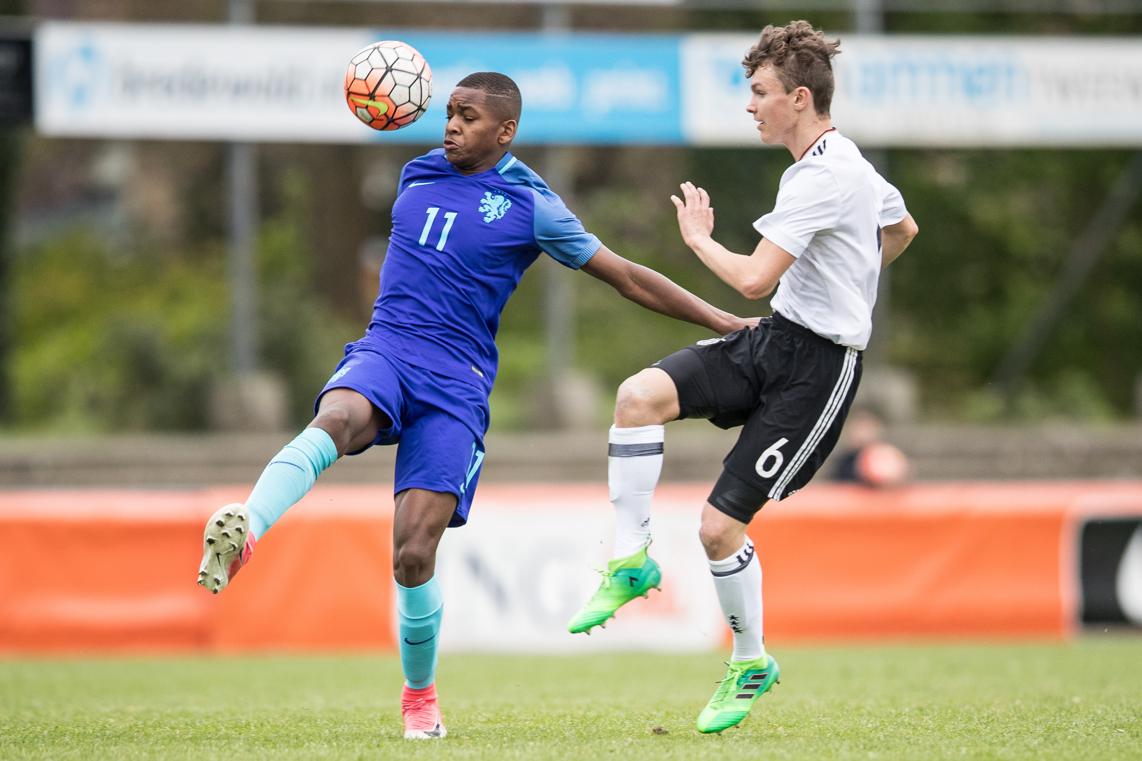 WEZEP, NETHERLANDS - MAY 04: Jordan Meyer of Germany and Jayden Braaf of Netherlands battle for the ball during U15 Netherlands v U15 Germany International Friendly Match on May 4, 2017 in Wezep, Netherlands. (Photo by Maja Hitij/Bongarts/Getty Images)