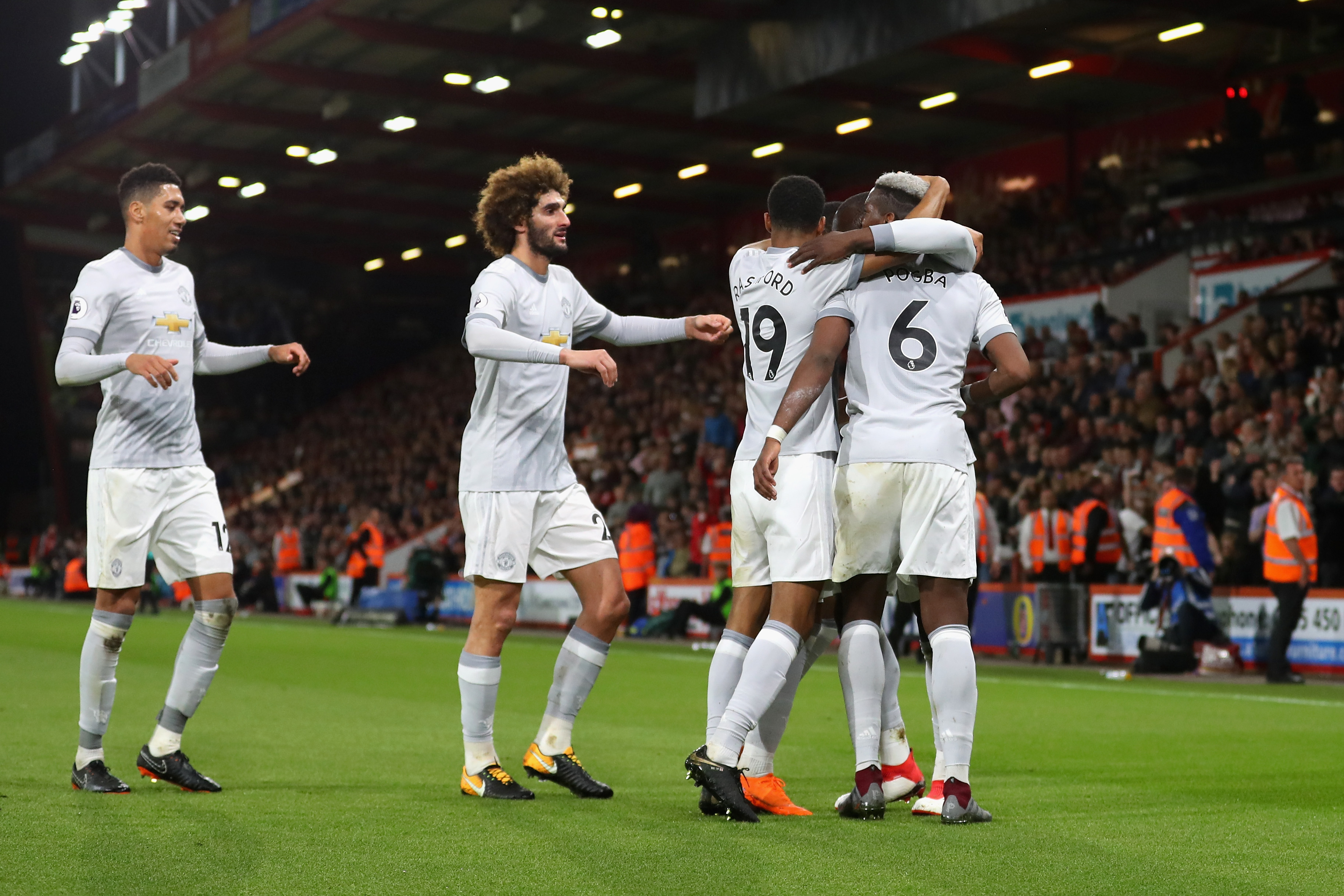 BOURNEMOUTH, ENGLAND - APRIL 18:  Romelu Lukaku of Manchester United celebrates with teammates after scoring his sides second goal during the Premier League match between AFC Bournemouth and Manchester United at Vitality Stadium on April 18, 2018 in Bournemouth, England.  (Photo by Catherine Ivill/Getty Images)