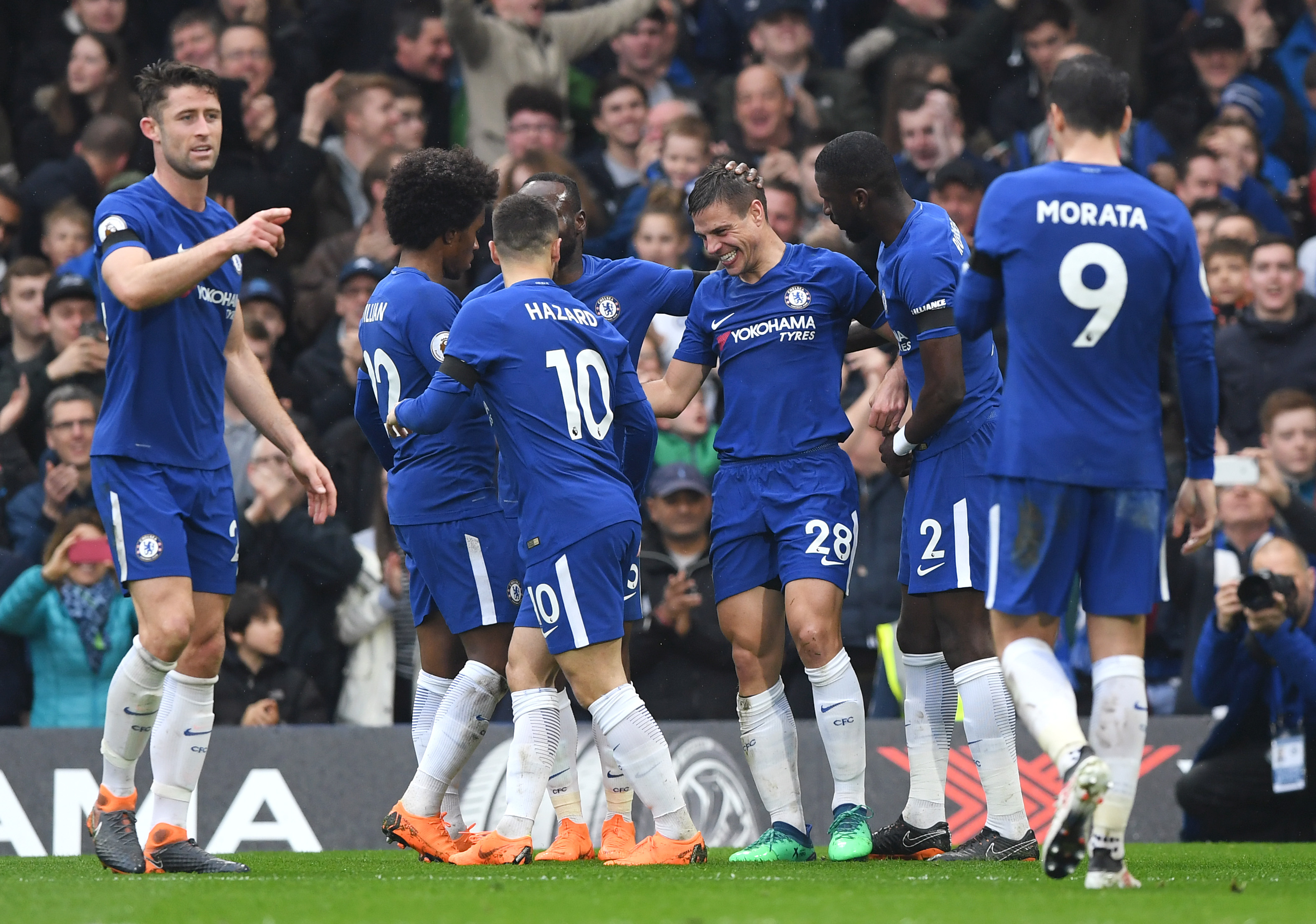 LONDON, ENGLAND - APRIL 08:  Cesar Azpilicueta of Chelsea celebrates with team mates after scores his sides first goal during the Premier League match between Chelsea and West Ham United at Stamford Bridge on April 8, 2018 in London, England.  (Photo by Shaun Botterill/Getty Images)