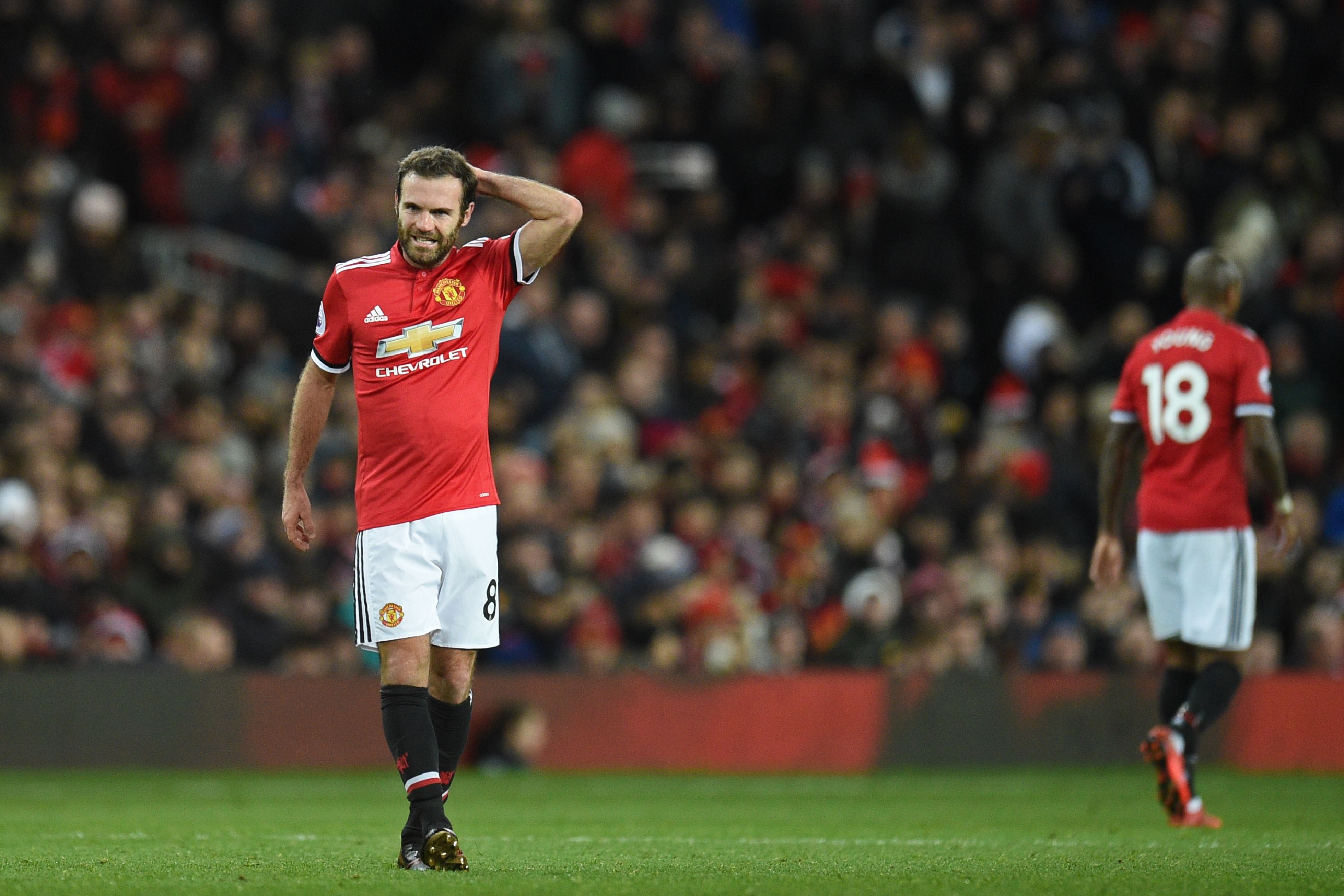 Manchester United's Spanish midfielder Juan Mata gestures during the English Premier League football match between Manchester United and Southampton at Old Trafford in Manchester, north west England, on December 30, 2017. / AFP PHOTO / Oli SCARFF / RESTRICTED TO EDITORIAL USE. No use with unauthorized audio, video, data, fixture lists, club/league logos or 'live' services. Online in-match use limited to 75 images, no video emulation. No use in betting, games or single club/league/player publications.  /         (Photo credit should read OLI SCARFF/AFP/Getty Images)