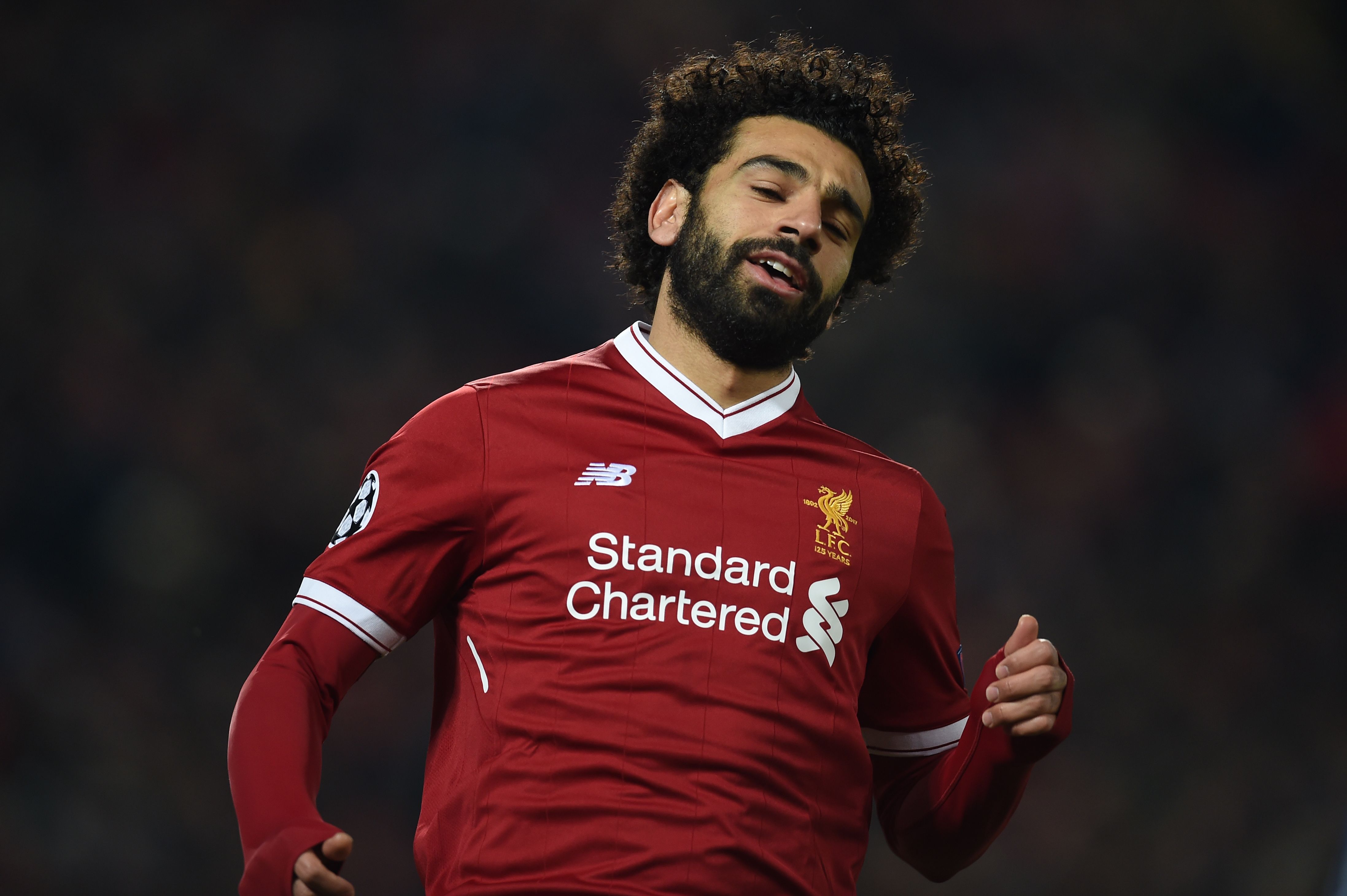 Liverpool's Egyptian midfielder Mohamed Salah gestures during the UEFA Champions League round of sixteen second leg football match between Liverpool and FC Porto at Anfield in Liverpool, north-west England on March 6, 2018. / AFP PHOTO / PAUL ELLIS        (Photo credit should read PAUL ELLIS/AFP/Getty Images)