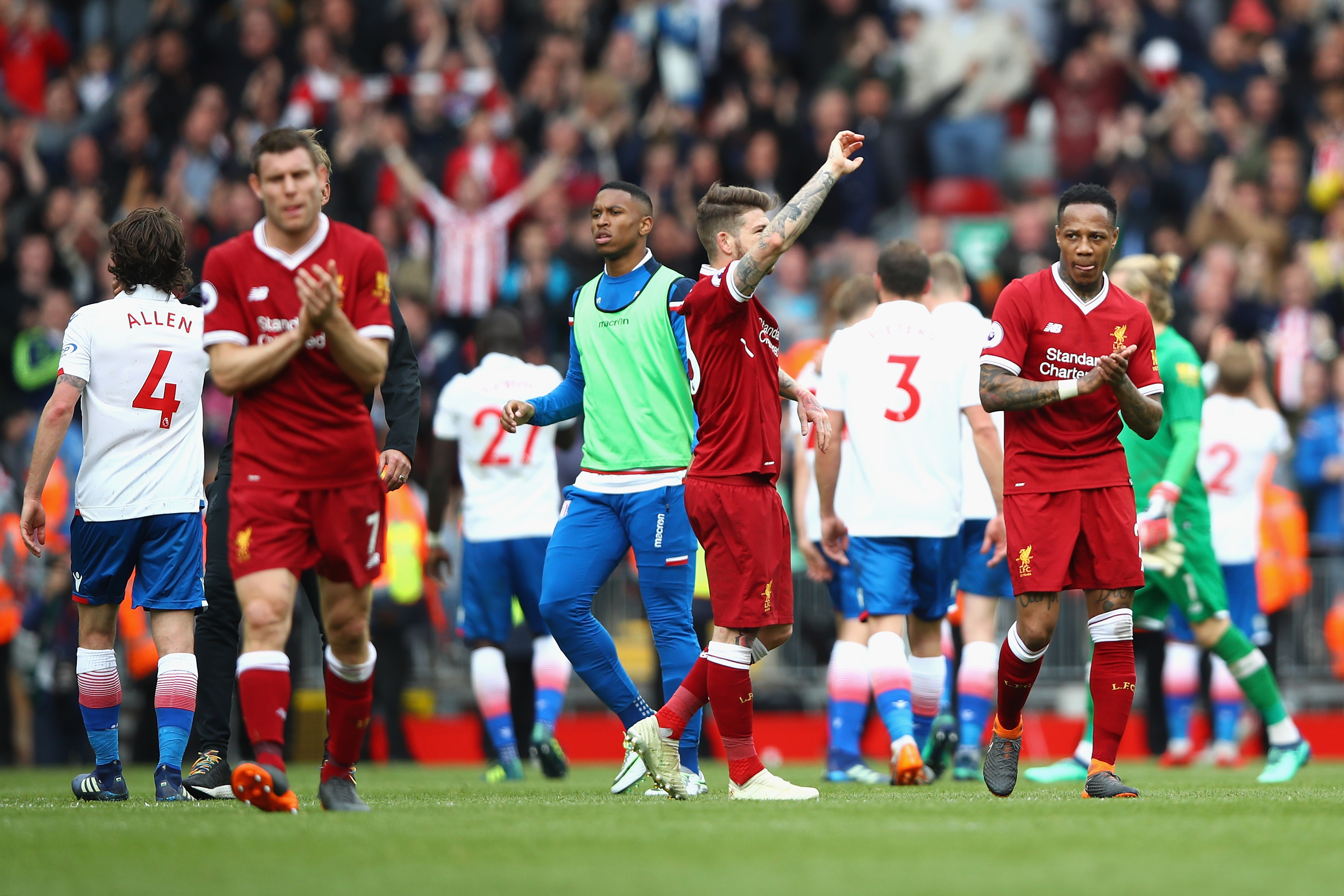LIVERPOOL, ENGLAND - APRIL 28:  Nathaniel Clyne of Liverpool applauds fans during the Premier League match between Liverpool and Stoke City at Anfield on April 28, 2018 in Liverpool, England.  (Photo by Clive Brunskill/Getty Images)
