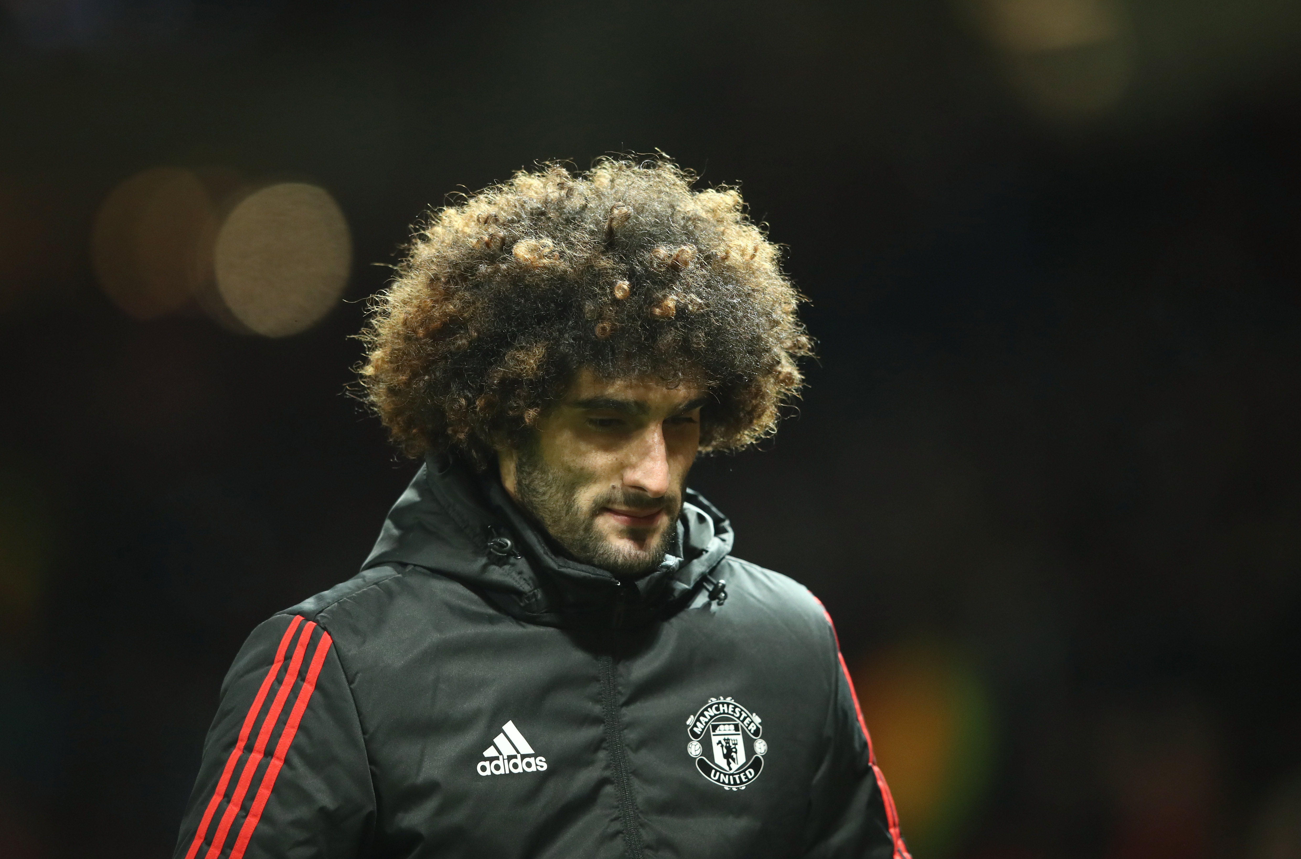 MANCHESTER, ENGLAND - MARCH 13:  Marouane Fellaini of Manchester United looks dejected in defeat after the UEFA Champions League Round of 16 Second Leg match between Manchester United and Sevilla FC at Old Trafford on March 13, 2018 in Manchester, United Kingdom.  (Photo by Clive Mason/Getty Images)