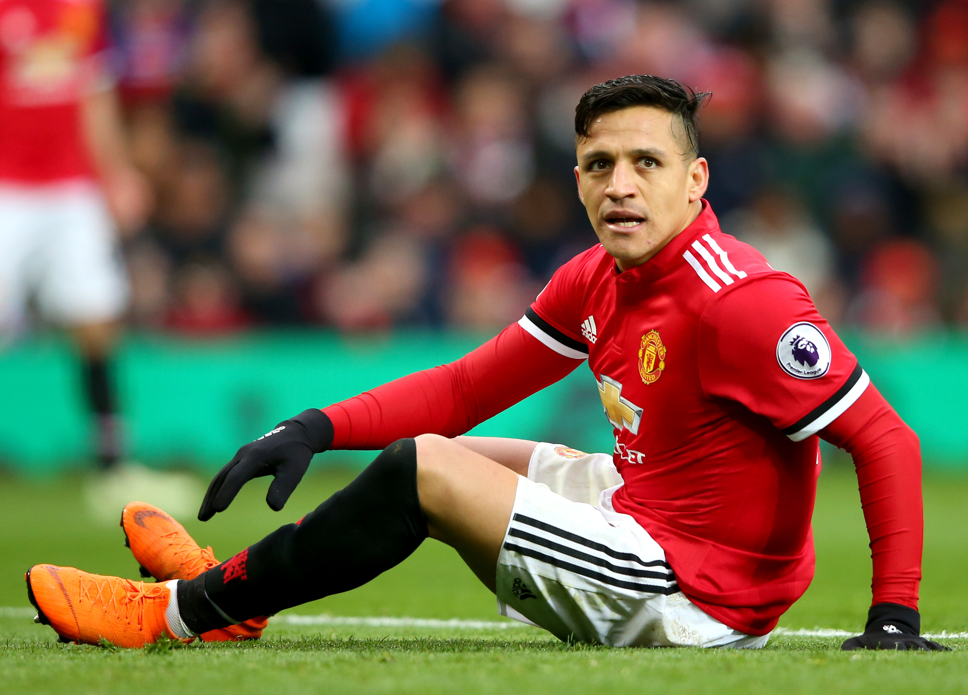 MANCHESTER, ENGLAND - MARCH 31: Alexis Sanchez of Manchester United reacts during the Premier League match between Manchester United and Swansea City at Old Trafford on March 31, 2018 in Manchester, England.  (Photo by Alex Livesey/Getty Images)