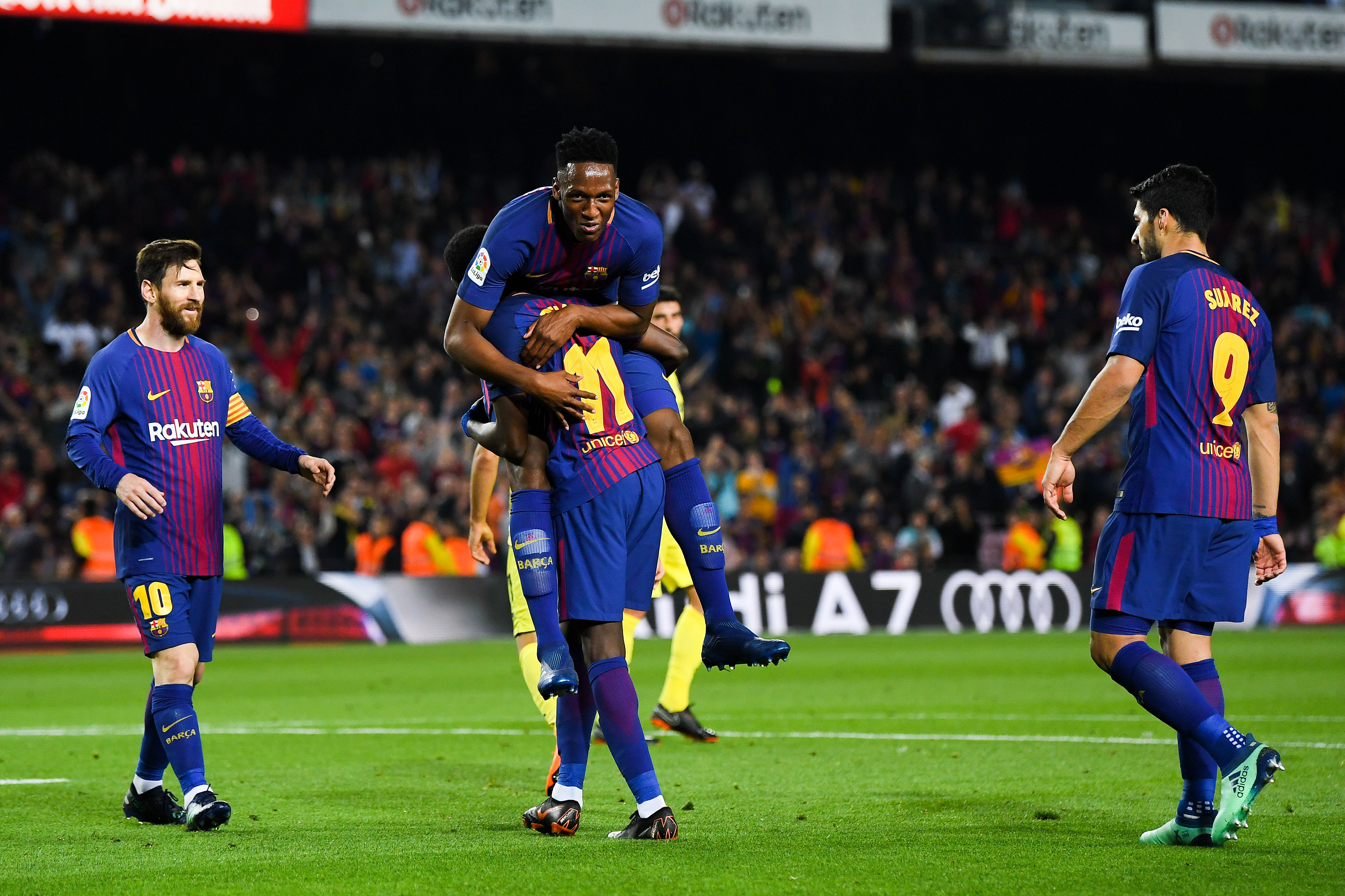 BARCELONA, SPAIN - MAY 09:  Oussame Dembele of FC Barcelona celebrates with his team mates Yerry Minam Lionel Messi and Luis Suarez  after scoring his team's fifth goal during the La Liga match between FC Barcelona and Villarreal at Camp Nou on May 9, 2018 in Barcelona, Spain.  (Photo by David Ramos/Getty Images)