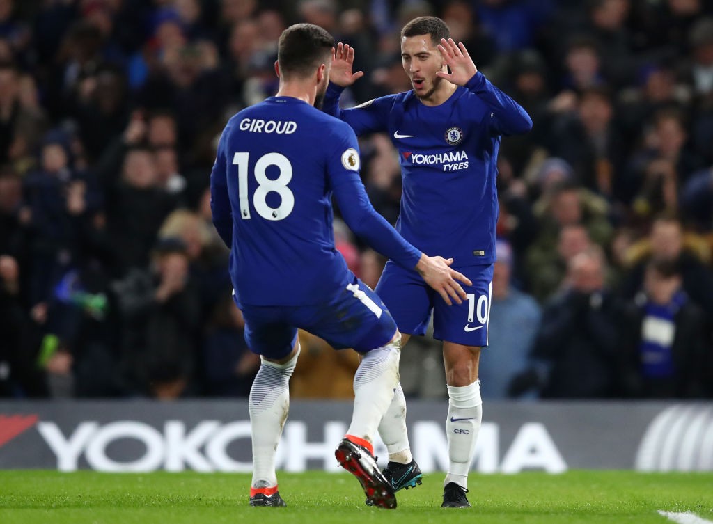 LONDON, ENGLAND - FEBRUARY 12: Eden Hazard of Chelsea celebrates after scoring his sides first goal with Olivier Giroud of Chelsea during the Premier League match between Chelsea and West Bromwich Albion at Stamford Bridge on February 12, 2018 in London, England. (Photo by Julian Finney/Getty Images)