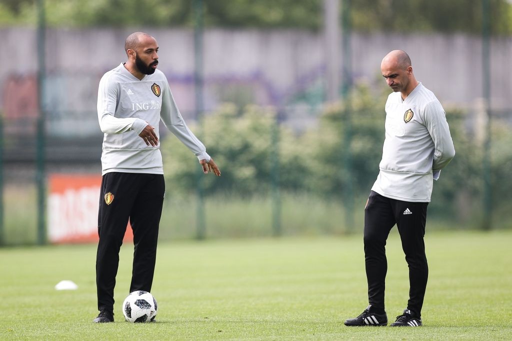Belgian national football team Red Devils' assistant coach Thierry Henry (L) and head coach Roberto Martinez take part in a training session on May 23, 2018, in Tubize. - At the start of the week, head coach announced the 23 players selected for the upcoming FIFA World Cup 2018 in Russia. (Photo by BRUNO FAHY / Belga / AFP) / Belgium OUT (Photo credit should read BRUNO FAHY/AFP/Getty Images)
