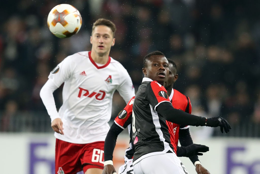 Nice's Ivorian midfielder Jean Michael Seri (L) vies with Lokomotiv's Anton Miranchuk (L) during the UEFA Europa League football match between Nice and Lokomotiv Moscow on February 15, 2018, at the Allianz Riviera stadium in Nice, southeastern France. / AFP PHOTO / VALERY HACHE (Photo credit should read VALERY HACHE/AFP/Getty Images)