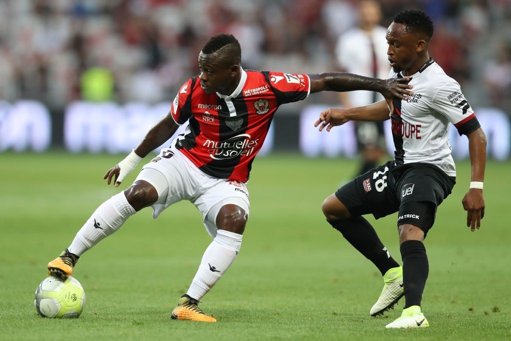 Nice's Ivorian midfielder Jean Michael Seri (L) vies with Guingamp's South-African midfielder Lebogang Phiri (R) during the French L1 football match Nice (OGCN) vs Guingamp (EAG) on August 19, 2017 at the 'Allianz Riviera' stadium in Nice, southeastern France. / AFP PHOTO / VALERY HACHE (Photo credit should read VALERY HACHE/AFP/Getty Images)