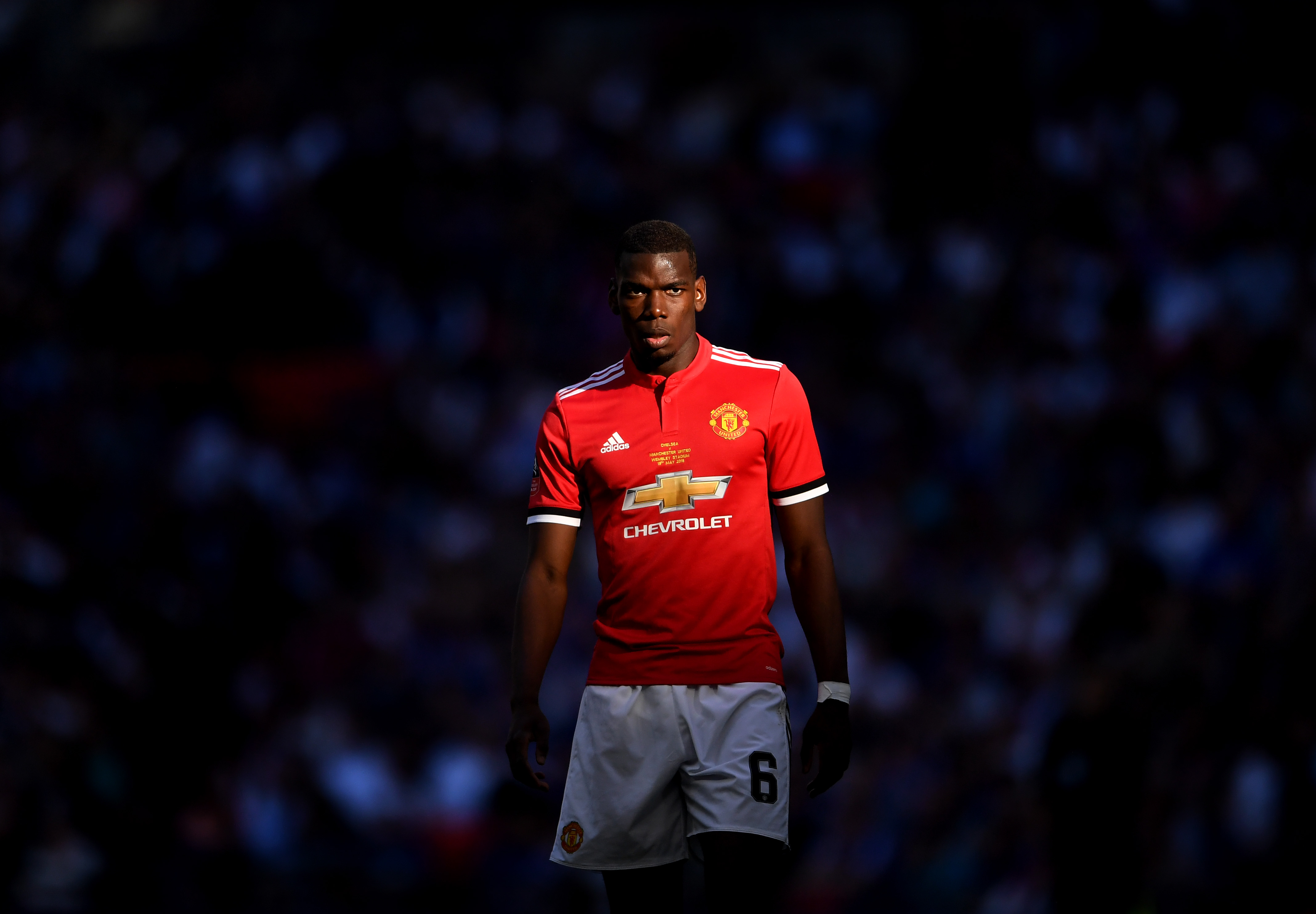 LONDON, ENGLAND - MAY 19:  Paul Pogba of Manchester United looks on during The Emirates FA Cup Final between Chelsea and Manchester United at Wembley Stadium on May 19, 2018 in London, England.  (Photo by Laurence Griffiths/Getty Images)