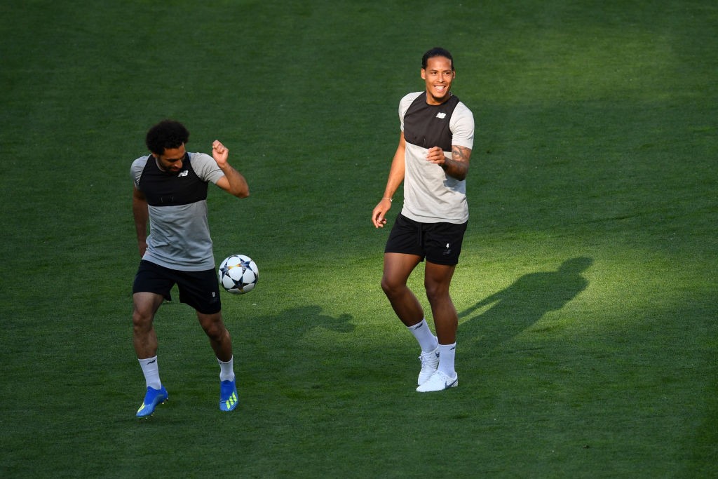 KIEV, UKRAINE - MAY 25: Mohamed Salah of Liverpool and Virgil van Dijk of Liverpool in action during a Liverpool training session ahead of the UEFA Champions League Final against Real Madrid at NSC Olimpiyskiy Stadium on May 25, 2018 in Kiev, Ukraine. (Photo by Mike Hewitt/Getty Images)