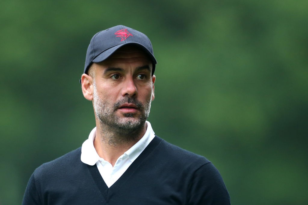 VIRGINIA WATER, ENGLAND - MAY 23: Pep Guardiola looks on during the Pro Am for the BMW PGA Championship at Wentworth on May 23, 2018 in Virginia Water, England. (Photo by Alex Pantling/Getty Images)