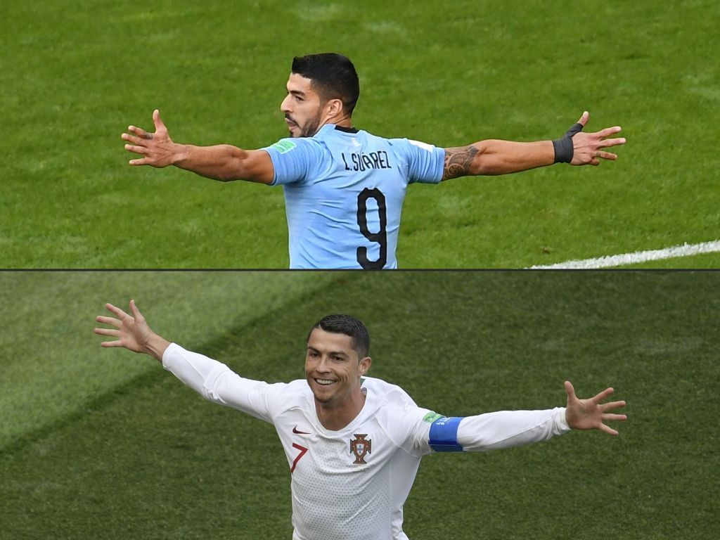 (COMBO) This combination of pictures created on June 28, 2018 shows Uruguay's forward Luis Suarez (top) in Samara on June 25, 2018, and Portugal's forward Cristiano Ronaldo celebrates in Moscow on June 20, 2018. - The European champions, Portugal, will face Uruguay in Sochi on June 30, for a place in the quarter-finals after finishing as runners-up behind Spain in Group B. (Photos by Manan VATSYAYANA and Juan Mabromata / AFP) / RESTRICTED TO EDITORIAL USE - NO MOBILE PUSH ALERTS/DOWNLOADS RESTRICTED TO EDITORIAL USE - NO MOBILE PUSH ALERTS/DOWNLOADS (Photo credit should read MANAN VATSYAYANA,JUAN MABROMATA/AFP/Getty Images)