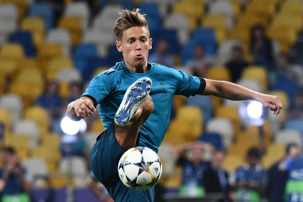 Real Madrid's Spanish miedfieder Marcos Llorente controls the ball during a Real Madrid team training session at the Olympic Stadium in Kiev, Ukraine on May 25, 2018, on the eve of the UEFA Champions League final football match between Liverpool and Real Madrid. (Photo by Franck FIFE / AFP) (Photo credit should read FRANCK FIFE/AFP/Getty Images)