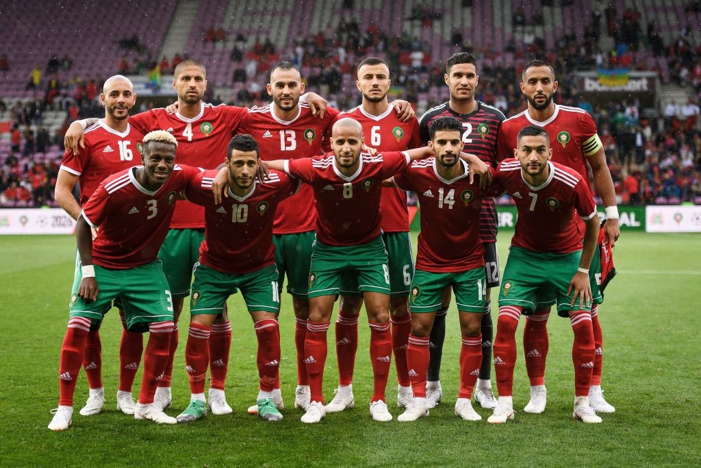 Morroco's national football team (From L) second row, forward Noureddine Amrabat, defender Manuel Da Costa, forward Khalid Boutaib, defender Romain Saiss, goalkeeper Mounir El Kajoui and defender Medhi Amine El Mouttaqi Benatia (Front row), defender Hamza Mendyl, midfielder Younes Belhanda, midfielder Karim El Ahmadi, midfielder M'bark Boussoufa and midfielder Hakim Ziyech pose prior to the friendly football match between Morocco and Ukraine at the Stade de Geneve stadium in Geneva on May 31, 2018 (Photo by Fabrice COFFRINI / AFP) (Photo credit should read FABRICE COFFRINI/AFP/Getty Images)