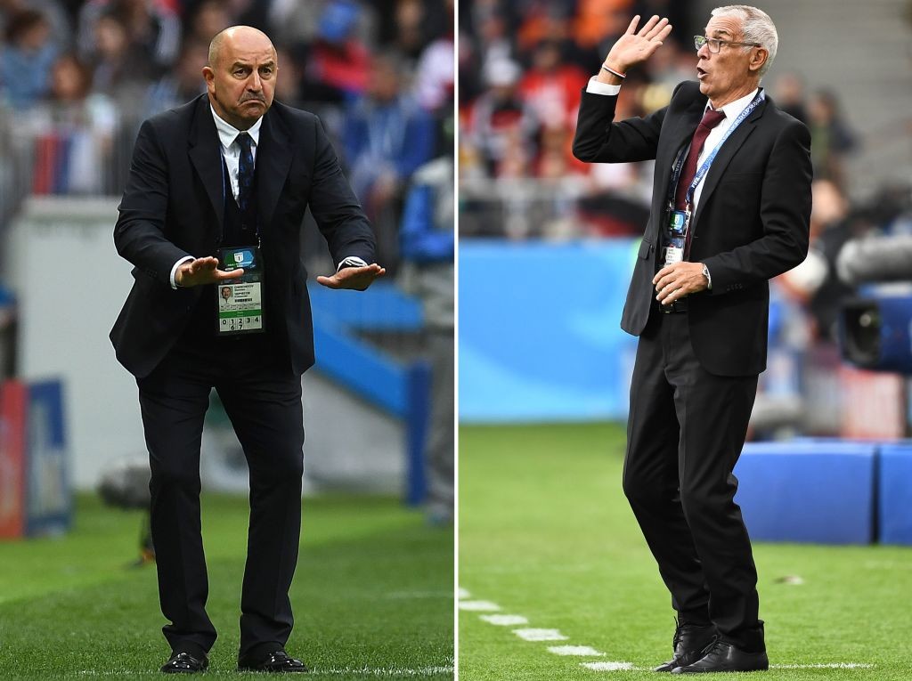 (COMBO) This combination of pictures created on June 17, 2018 shows Russia's coach Stanislav Cherchesov at the Luzhniki Stadium in Moscow on June 14, 2018 (L) and Egypt's coach Hector Raul Cuper at the Ekaterinburg Arena in Ekaterinburg on June 15, 2018. - Russia will play Egypt in their Russia 2018 World Cup Group A football match at the Saint Petersburg Stadium in Saint Petersburg on June 19, 2018. (Photo by Patrik STOLLARZ and Anne-Christine POUJOULAT / AFP) (Photo credit should read PATRIK STOLLARZ,ANNE-CHRISTINE POUJOULAT/AFP/Getty Images)