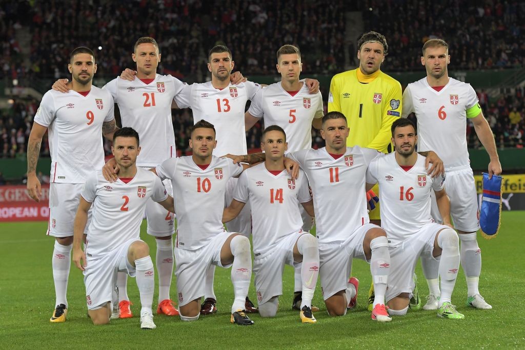 Serbia's players pose for a family picture before the FIFA World Cup 2018 qualification football match between Austria and Serbia at the Ernst Happel stadium in Vienna on October 6, 2017. / AFP PHOTO / JOE KLAMAR (Photo credit should read JOE KLAMAR/AFP/Getty Images)