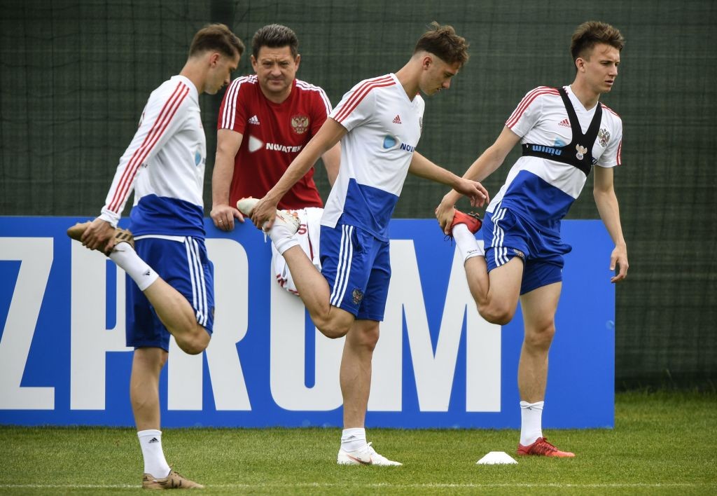 From L: Russia's forward Alexey Miranchuk, Russia's midfielder Anton Miranchuk and Russia's midfielder Alexander Golovin attend a training session in Novogorsk outside Moscow on June 12, 2018, ahead of the Russia 2018 World Cup football tournament. (Photo by Alexander NEMENOV / AFP) (Photo credit should read ALEXANDER NEMENOV/AFP/Getty Images)