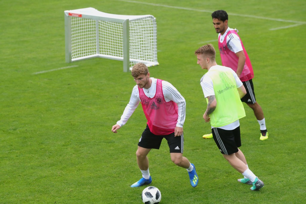 EPPAN, ITALY - MAY 24: Timo Werner (L), Marco Reus and Ilkay Guendogan play with the ball during a training session of the German national team at Sportanlage Rungg on day two of the Southern Tyrol Training Camp on May 24, 2018 in Eppan, Italy. (Photo by Alexander Hassenstein/Bongarts/Getty Images)