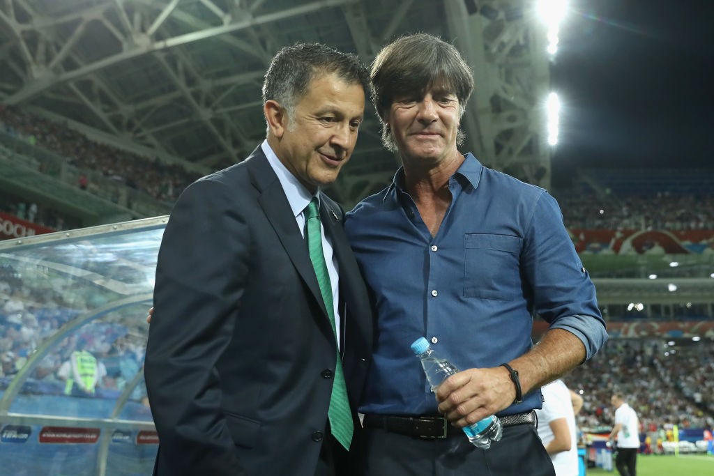 SOCHI, RUSSIA - JUNE 29: Joachim Loew, head coach of Germany and Juan Carlos Osorio, head coach of Mexico greet prior to the FIFA Confederations Cup Russia 2017 Semi-Final between Germany and Mexico at Fisht Olympic Stadium on June 29, 2017 in Sochi, Russia. (Photo by Alexander Hassenstein/Bongarts/Getty Images)