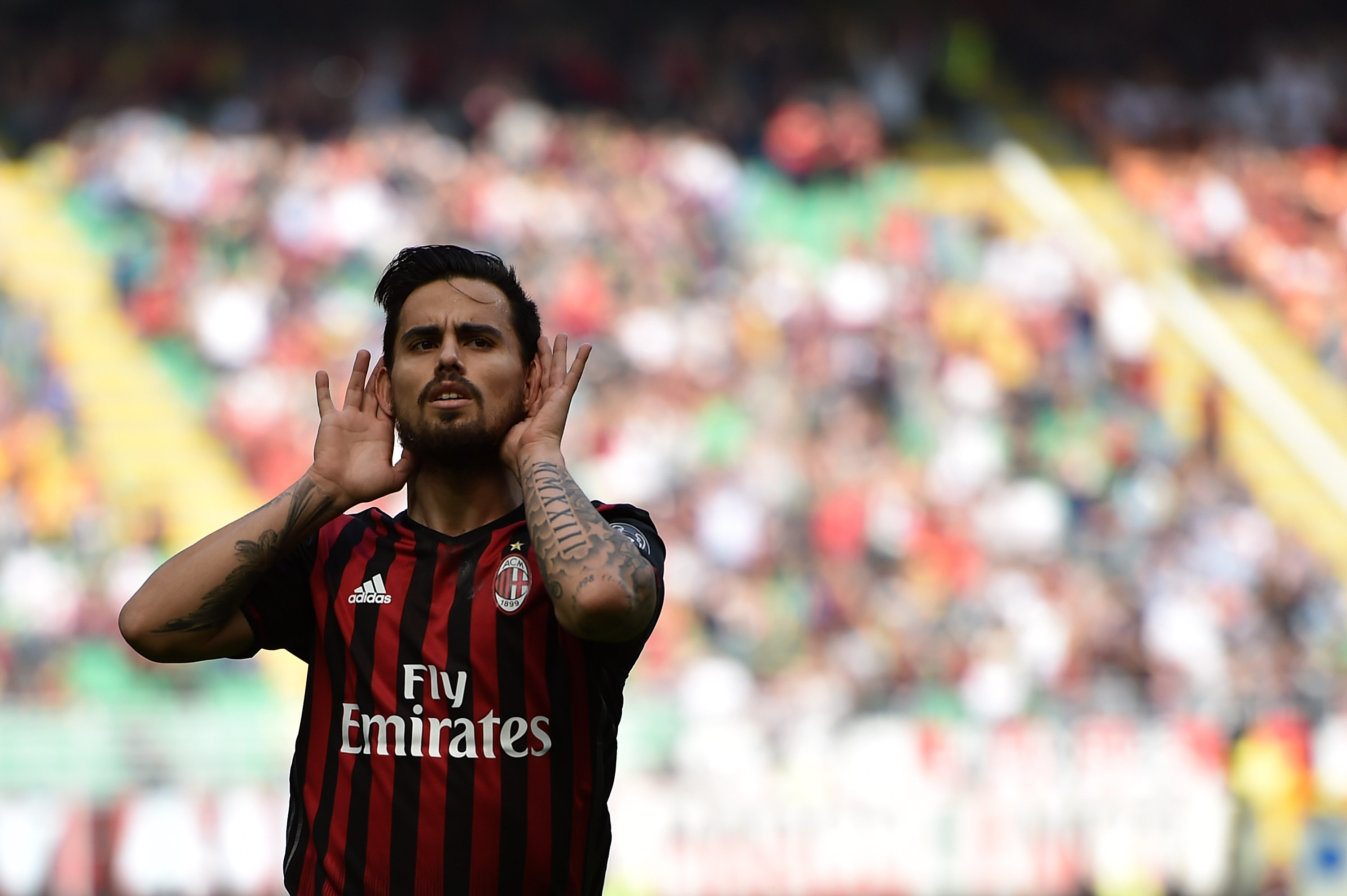 MILAN, ITALY - APRIL 09:  Suso of Milan celebrates after scoring the opening goal during the Serie A match between AC Milan and US Citta di Palermo at Stadio Giuseppe Meazza on April 9, 2017 in Milan, Italy.  (Photo by Tullio M. Puglia/Getty Images)