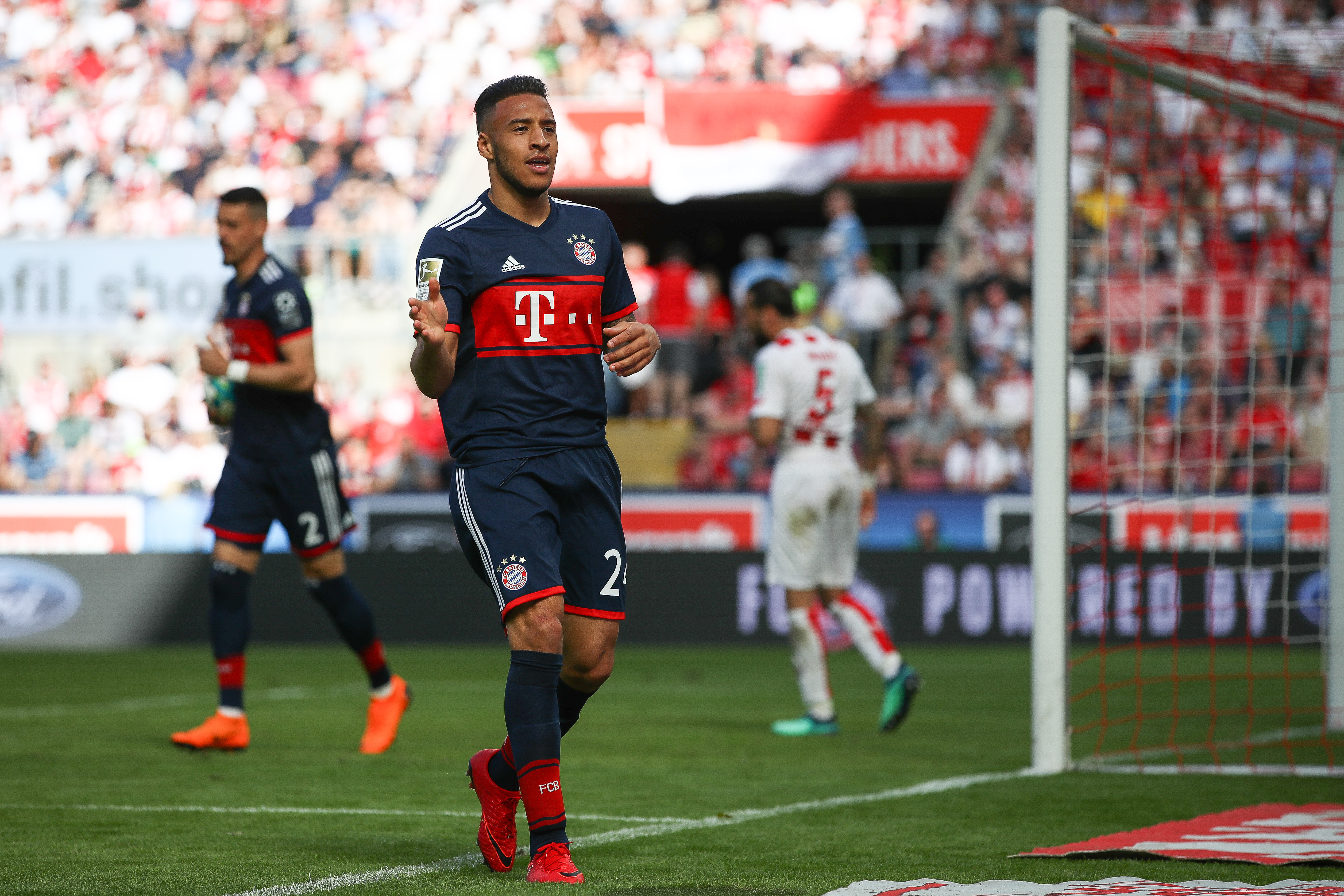 COLOGNE, GERMANY - MAY 05: Corentin Tolisso #24 of Bayern Munich celebrates after scoring a goal to make it 1-3 during the Bundesliga match between 1. FC Koeln and FC Bayern Muenchen at RheinEnergieStadion on May 5, 2018 in Cologne, Germany. (Photo by Maja Hitij/Bongarts/Getty Images)