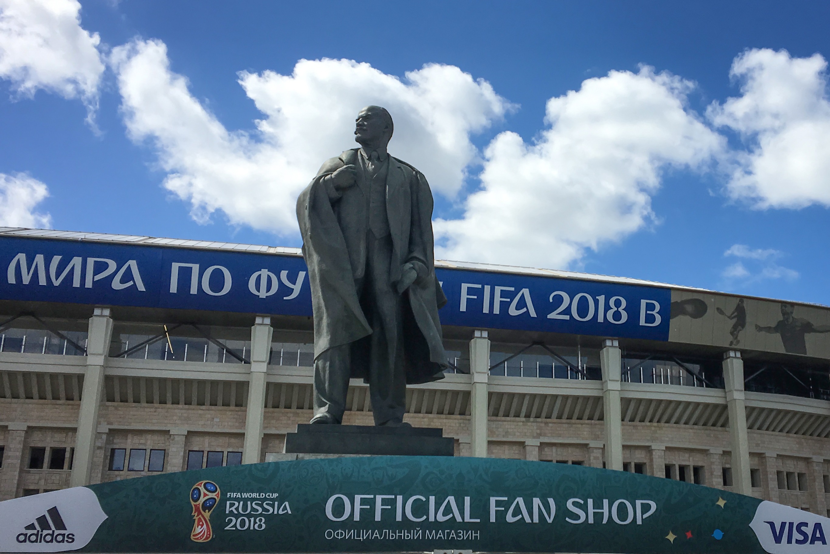 A picture taken on June 1, 2018 shows a monument to the Soviet Union founder Vladimir Lenin in front of the 80,000-seater Luzhniki Stadium as final preparations are under way for the 2018 FIFA World Cup football tournament, Moscow. (Photo by Mladen ANTONOV / AFP)        (Photo credit should read MLADEN ANTONOV/AFP/Getty Images)