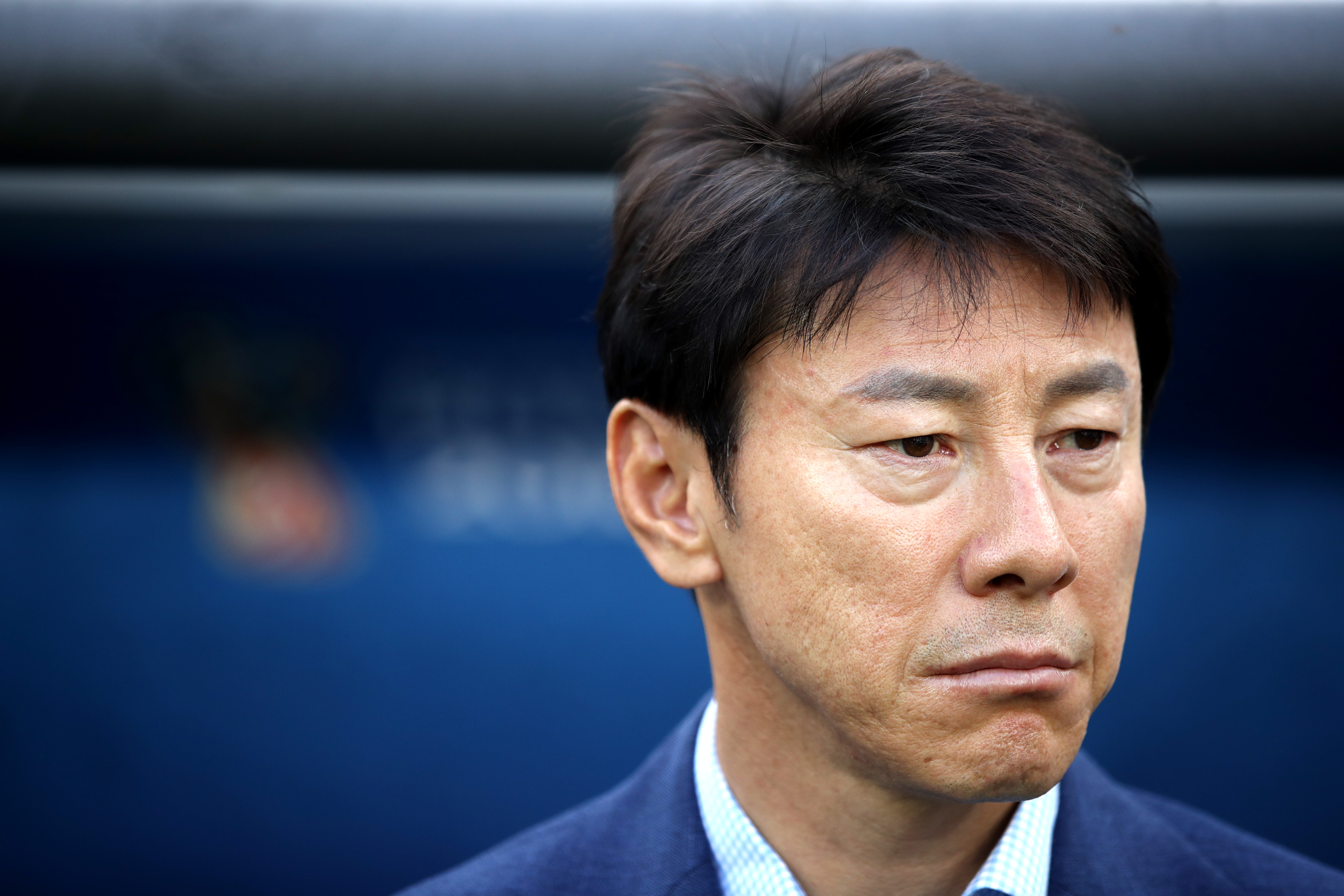 NIZHNIY NOVGOROD, RUSSIA - JUNE 18:  Shin Tae-Yong, Manager of Korea Republic looks on prior to the 2018 FIFA World Cup Russia group F match between Sweden and Korea Republic at Nizhniy Novgorod Stadium on June 18, 2018 in Nizhniy Novgorod, Russia.  (Photo by Clive Mason/Getty Images)